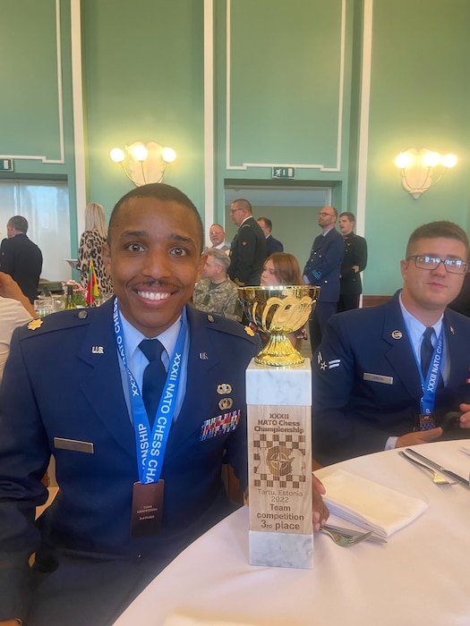 Maj. Gordon Randall (left), 88th Comptroller Squadron, poses with the U.S. national team’s third-place trophy July 1 at the 32nd annual NATO Chess Championship in Tartu, Estonia. The team defeated Germany to capture the bronze medal. (Contributed photo)
