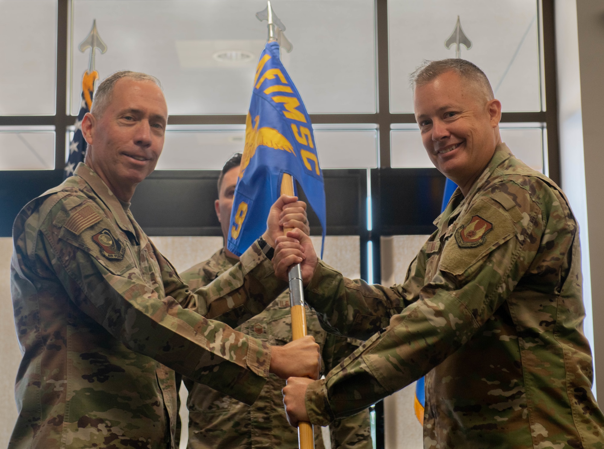 Airmen pass guidon