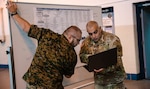 A member of the 169th Cyber Protection Team and members of the Armed Forces of Bosnia and Herzegovina conduct cyber adversarial exercises at the Pvt. Henry Costin Readiness Center in Laurel, Maryland, June 29, 2022. The Maryland National Guard and the Armed Forces Bosnia and Herzegovina have been partners under the Department of Defense National Guard Bureau State Partnership Program since 2003.
