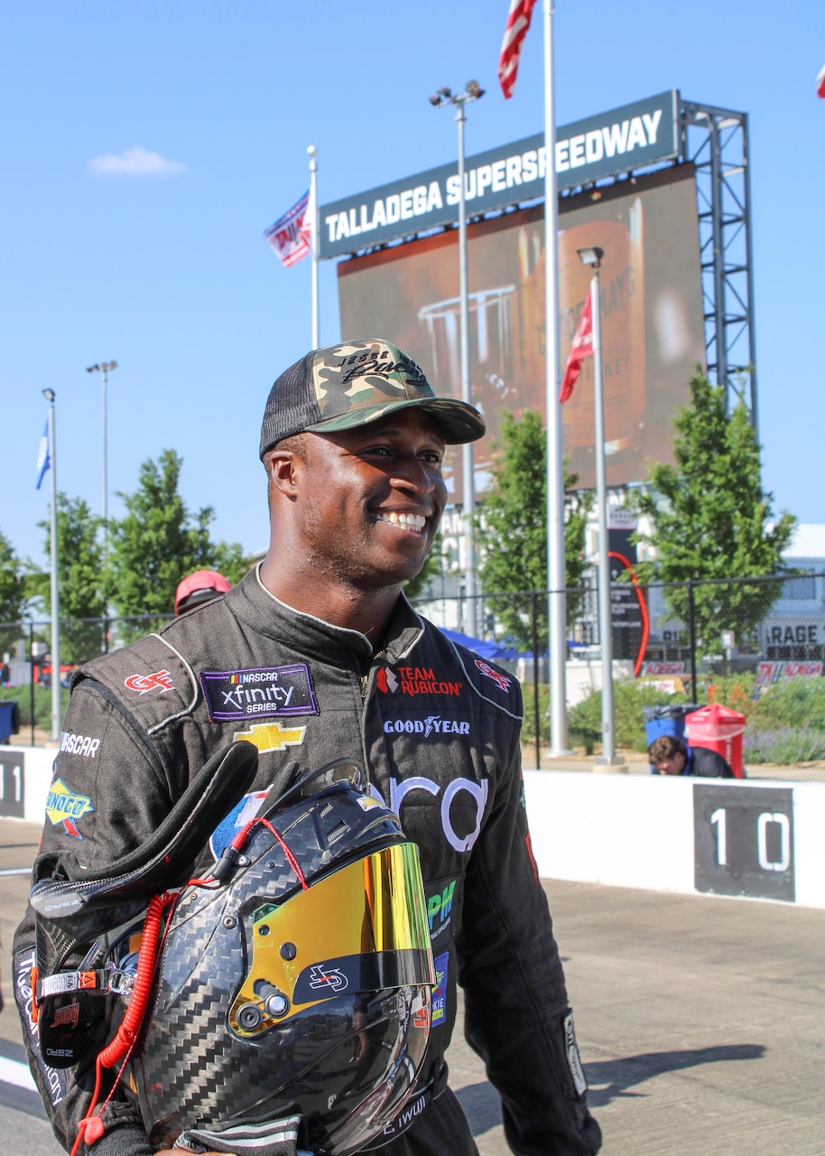 Navy Reserve Sailor, Lt. Cmdr. Jesse Iwuji, prepares to race at Talladega Superspeedway on April 22, 2022.