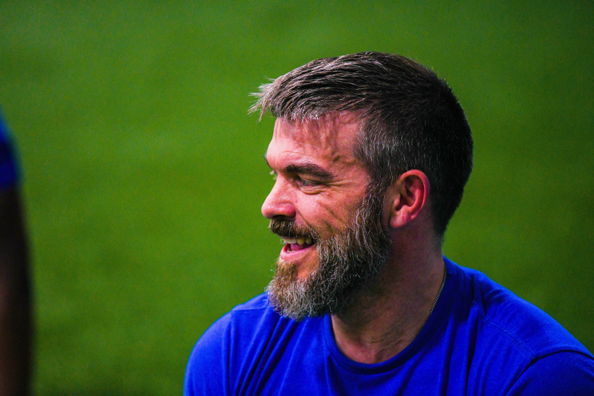 Brett Carbo, 75th Force Support Squadron training specialist, smiles while instructing a fitness improvement class at the Hess Fitness Center on Hill Air Force Base.