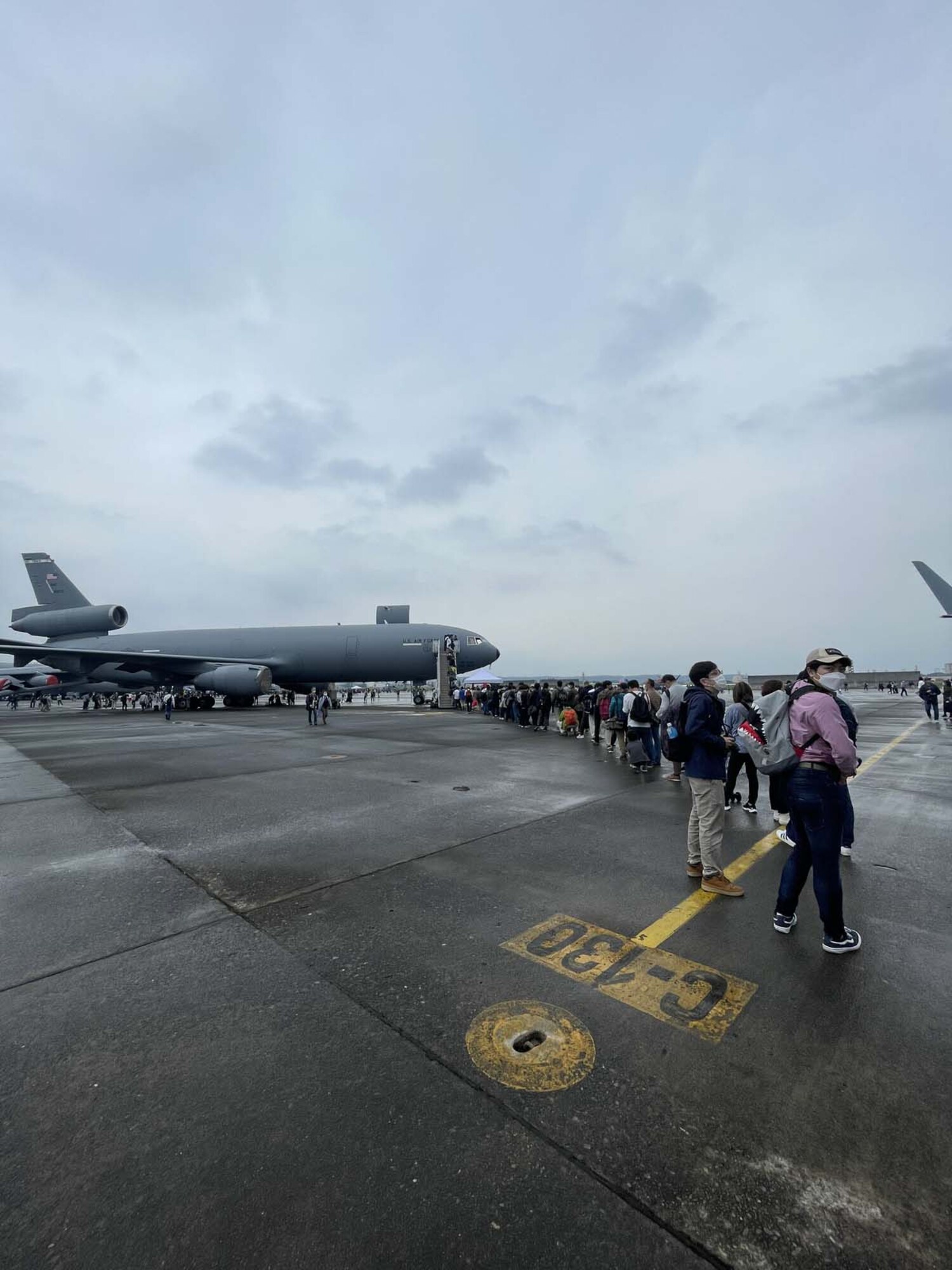 People gather to see a KC-10 Extender