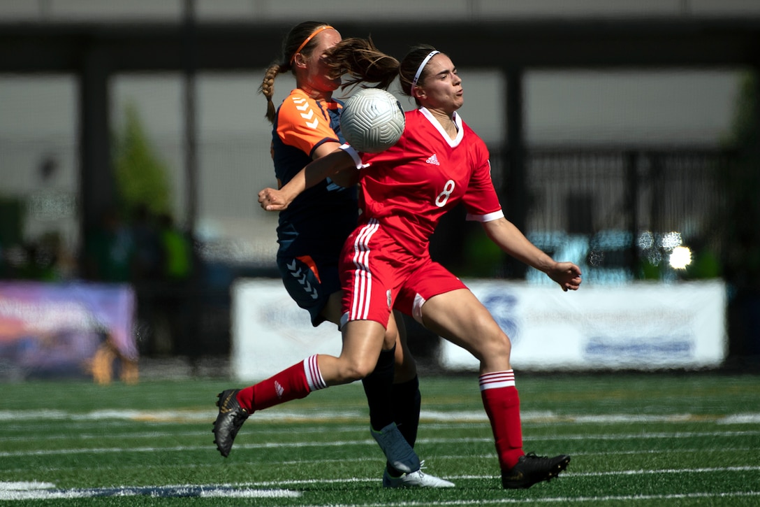 Canada’s Emile Cote steals a ball against Team Netherlands during the 13th CISM (International Military Sports Council) World Military Women’s Football Championship in Meade, Washington July 14, 2022. (DoD photo by EJ Hersom)