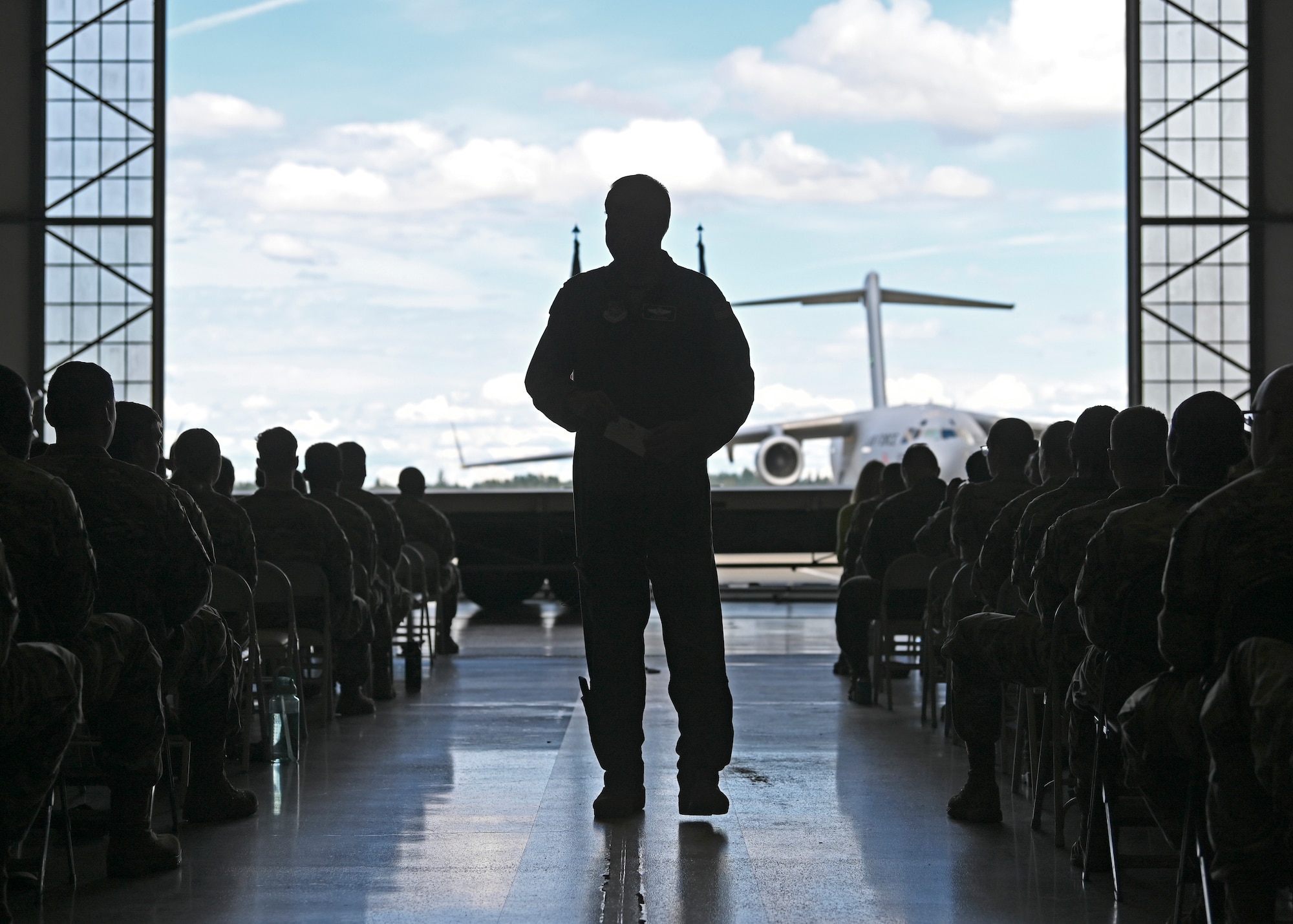 U.S. Air Force Gen. Mike Minihan, Air Mobility Command commander, gives remarks during an all-call at Joint Base Lewis-McChord, Washington, July 7, 2022. Minihan and Chief Master Sgt. Brian Kruzelnick, AMC command chief, spent two days visiting Team McChord to experience the way America’s Airlift Wing executes rapid global mobility. (U.S. Air Force photo by Senior Airman Callie Norton)