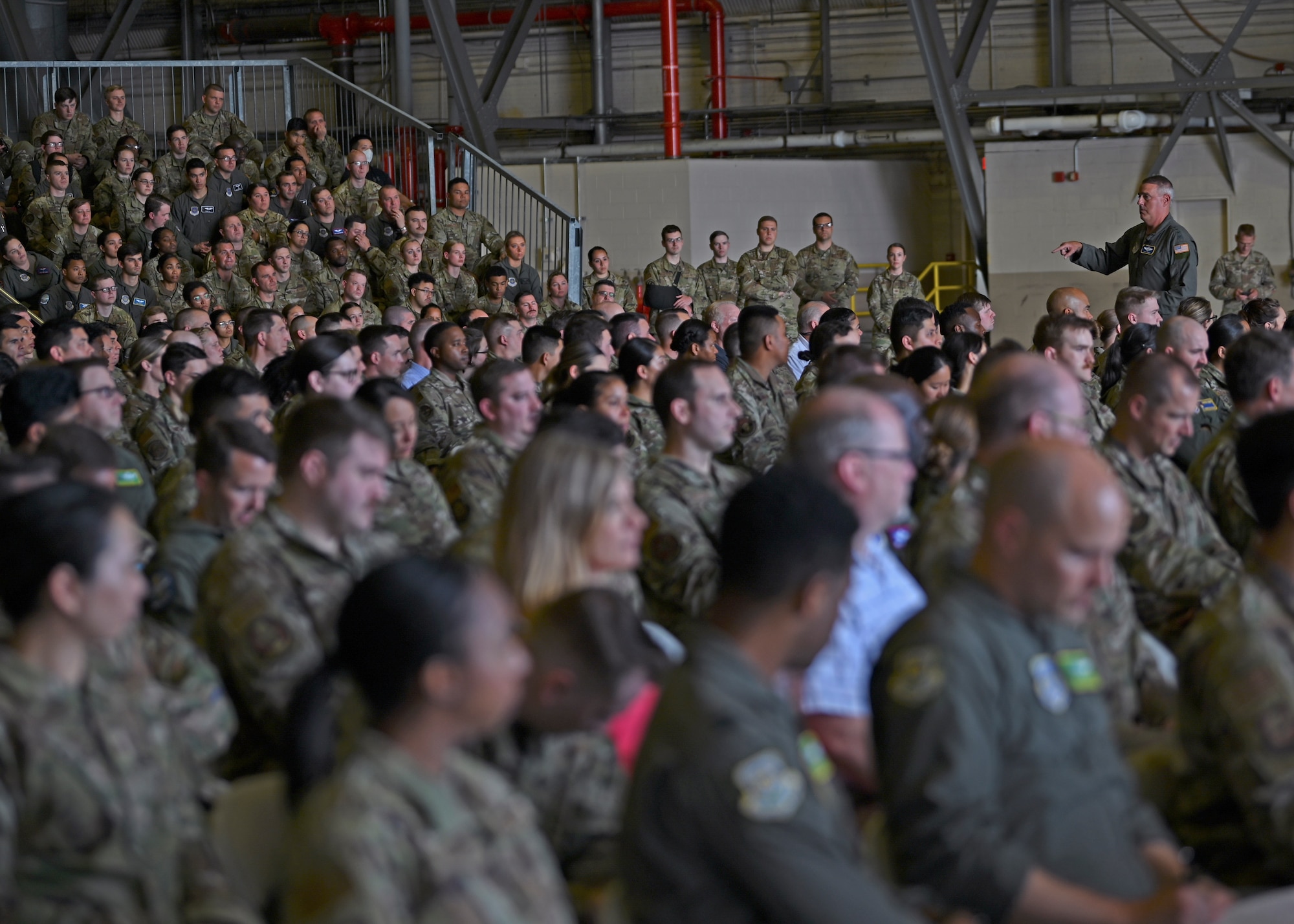 U.S. Air Force Gen. Mike Minihan, Air Mobility Command commander, gives remarks during an all-call at Joint Base Lewis-McChord, Washington, July 7, 2022. Minihan and Chief Master Sgt. Brian Kruzelnick, AMC command chief, spent two days visiting Team McChord to experience the way America’s Airlift Wing executes rapid global mobility. (U.S. Air Force photo by Senior Airman Callie Norton)