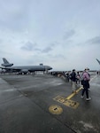 People gather to see a KC-10 Extender