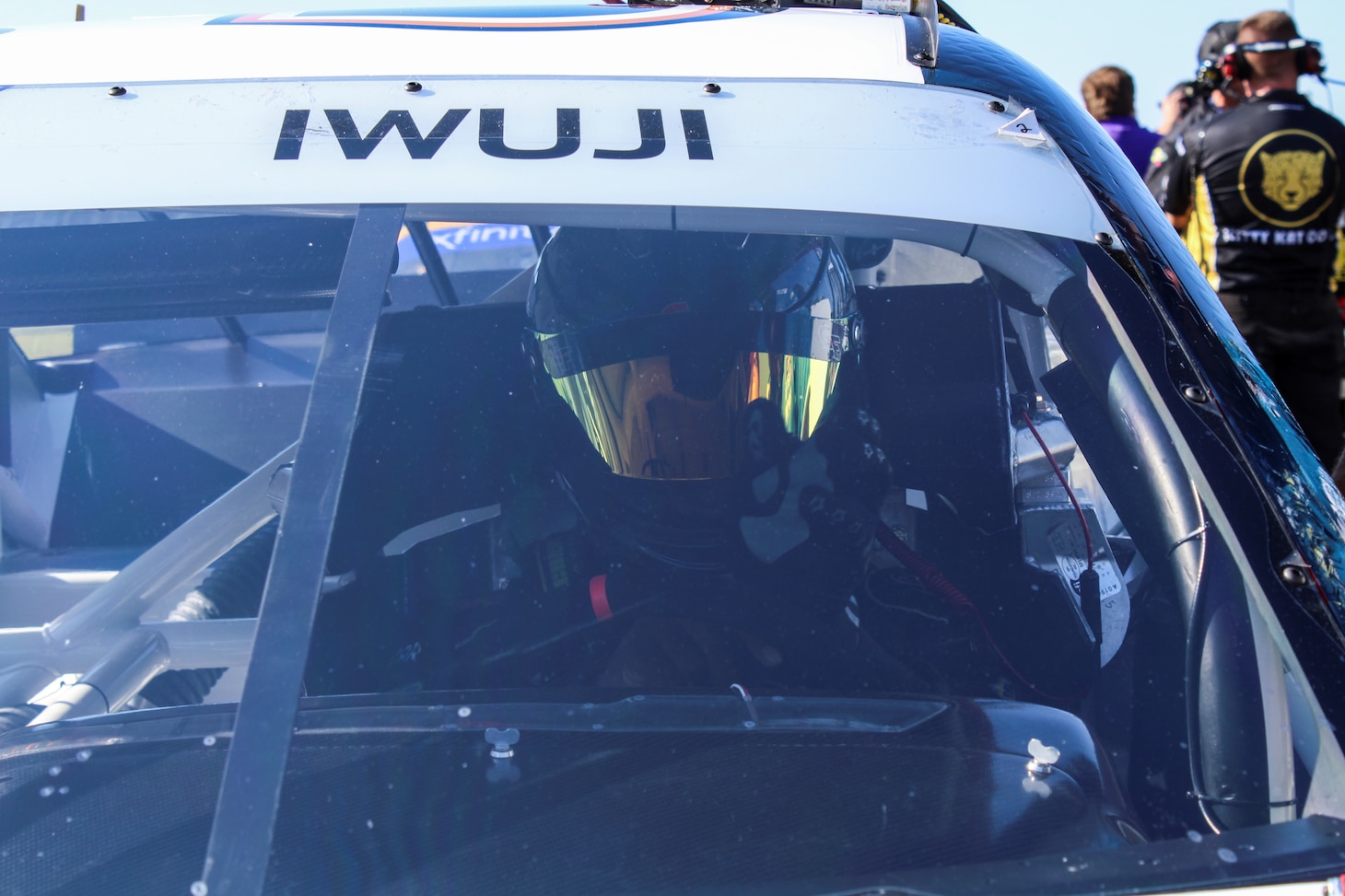 Navy Reserve Sailor, Lt. Cmdr. Jesse Iwuji, prepares to race at Talladega Superspeedway on April 22, 2022.