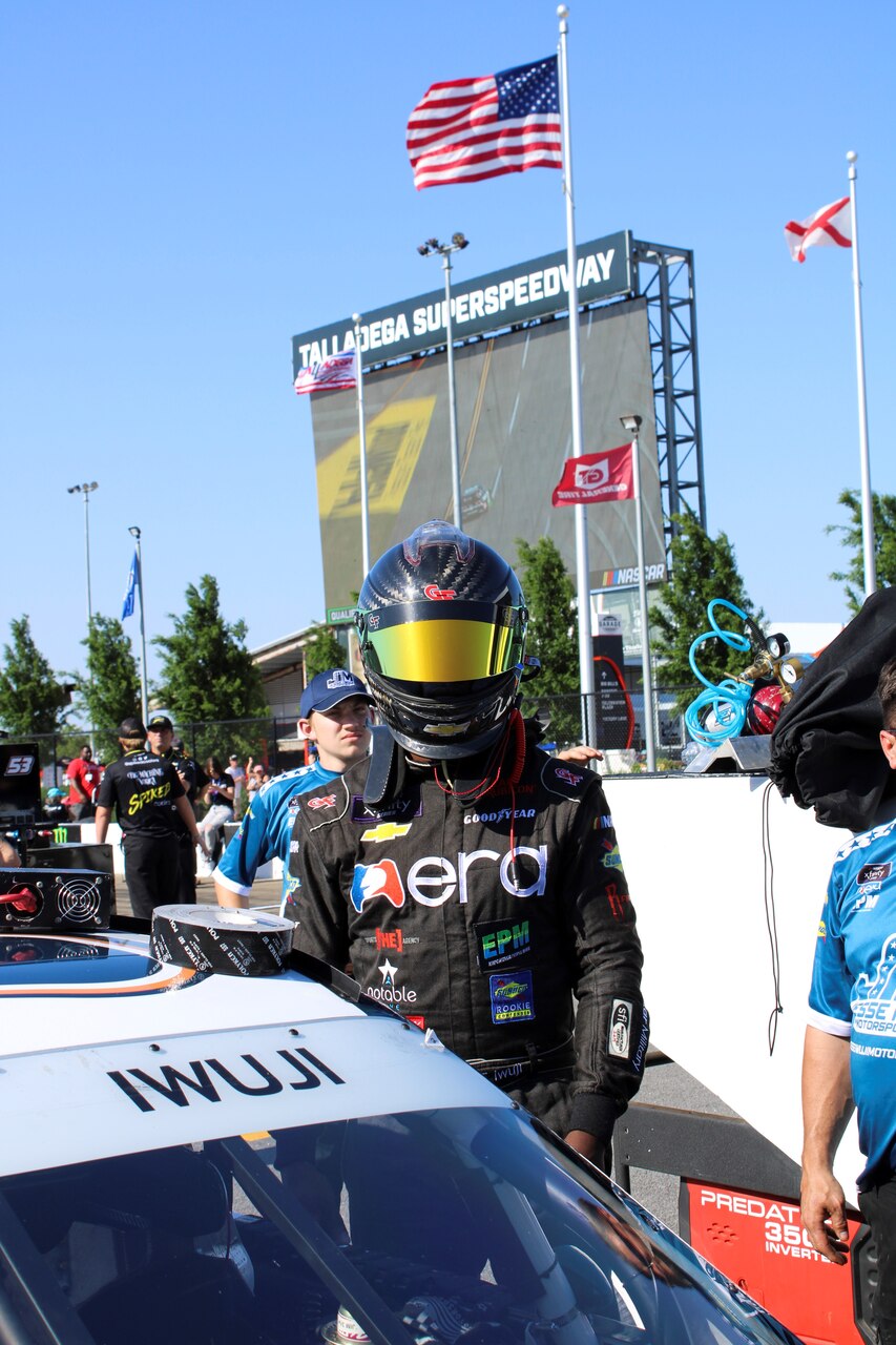 Navy Reserve Sailor, Lt. Cmdr. Jesse Iwuji, prepares to race at Talladega Superspeedway on April 22, 2022.