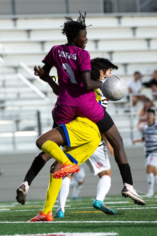 Mali goalkeeper Fatoumata Karentao takes down her team mate while making a save against South Korea during the 13th CISM (International Military Sports Council) World Military Women’s Football Championship in Meade, Washington July 14, 2022. (DoD photo by EJ Hersom)