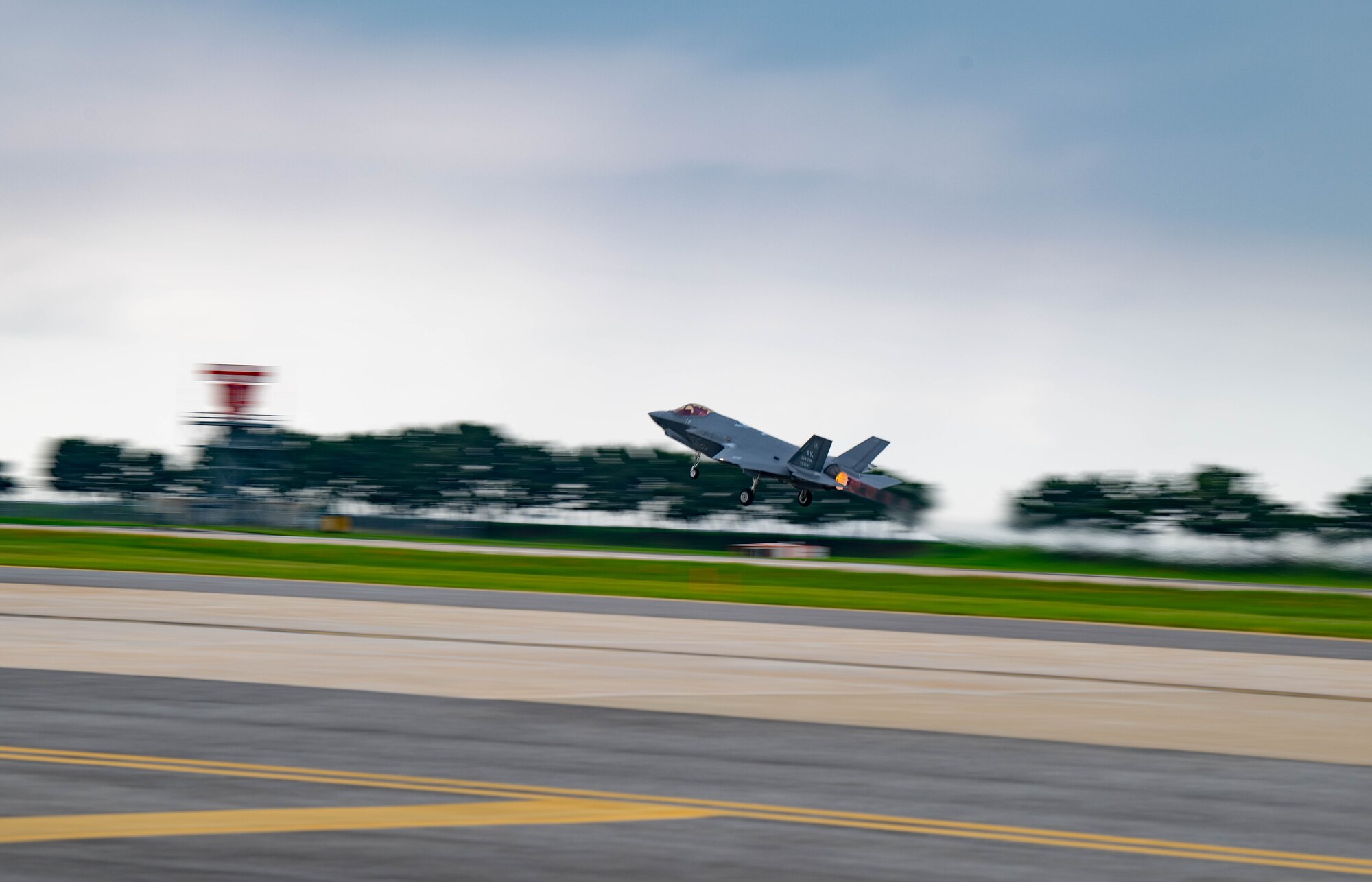 An F-35A Lightning II takes flight at Kunsan Air Base, Republic of Korea, July 11, 2022. U.S. Air Force F-35 aircraft from Eielson Air Force Base, Alaska arrived in the Republic of Korea to conduct training flights with ROKAF to enhance interoperability between the two Air Forces on and around the Korean Peninsula. (U.S. Air Force photo by Senior Airman Shannon Braaten)