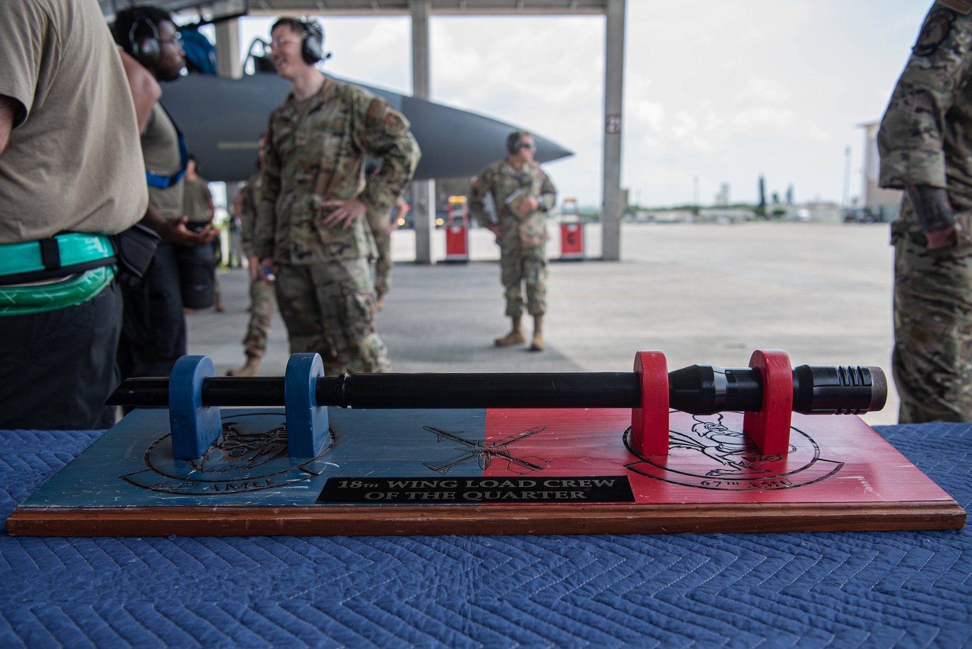 A trophy sits on a table at the F-15 Load Crew of the Quarter Competition for the 18th Aircraft Maintenance Squadron at Kadena Air Base, Japan, July 15, 2022.