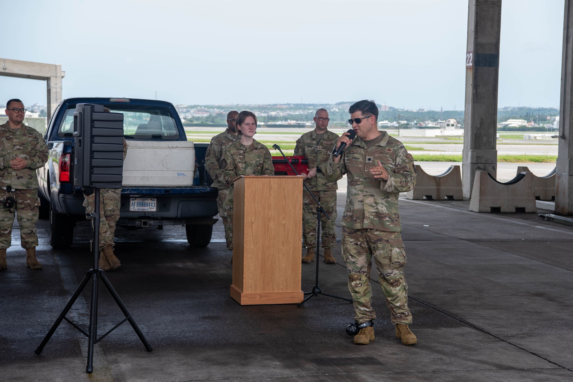 An officer gives a speech at the F-15 Load Crew of the Quarter Competition at Kadena Air Base, Japan, July 15, 2022.