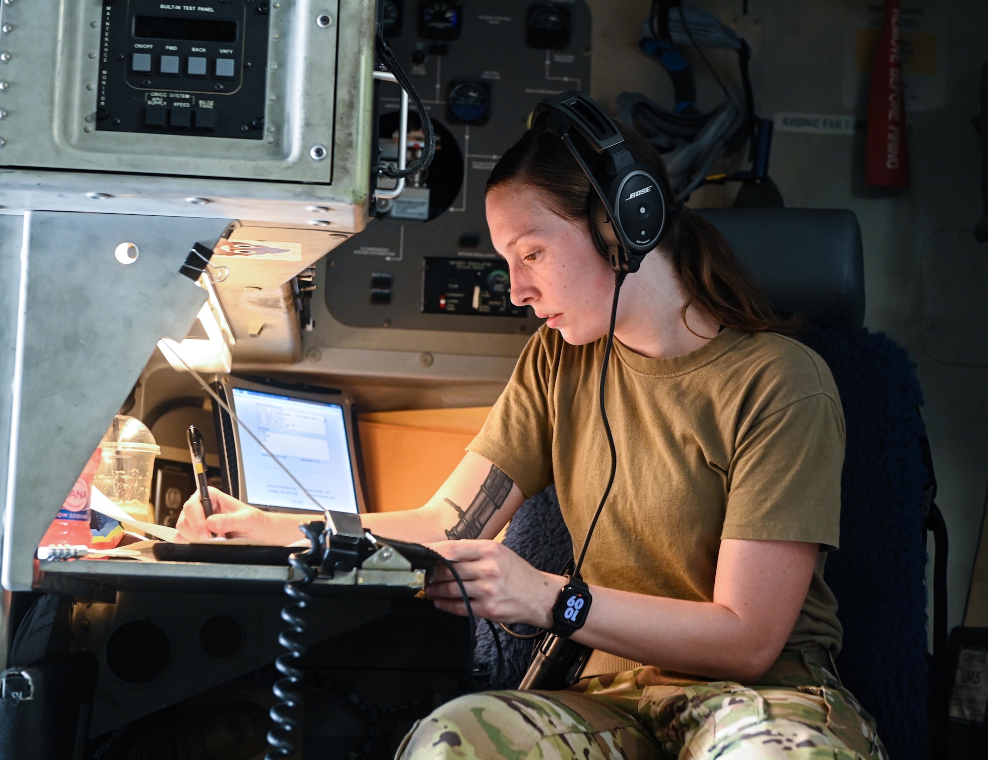 U.S. Air Force Senior Airman Nicole Snowden, an 816th Expeditionary Airlift Squadron loadmaster, goes through a preflight checklist July 12, 2022 at Al Udeid Airbase, Qatar. Loadmasters are responsible for the on-load, securing and off-load of any cargo on board an aircraft, as well as any passengers who may be flying. (U.S. Air National Guard photo by Tech. Sgt. Michael J. Kelly)