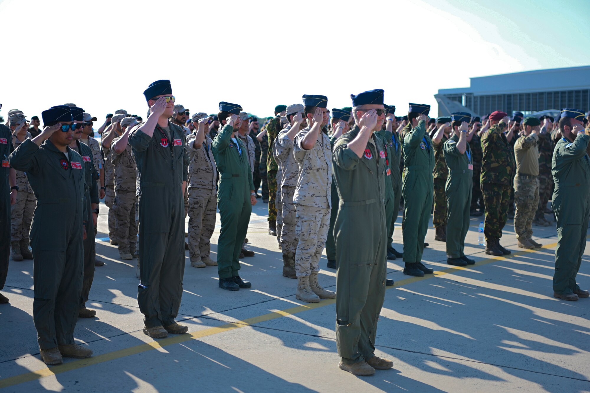 service members saluting