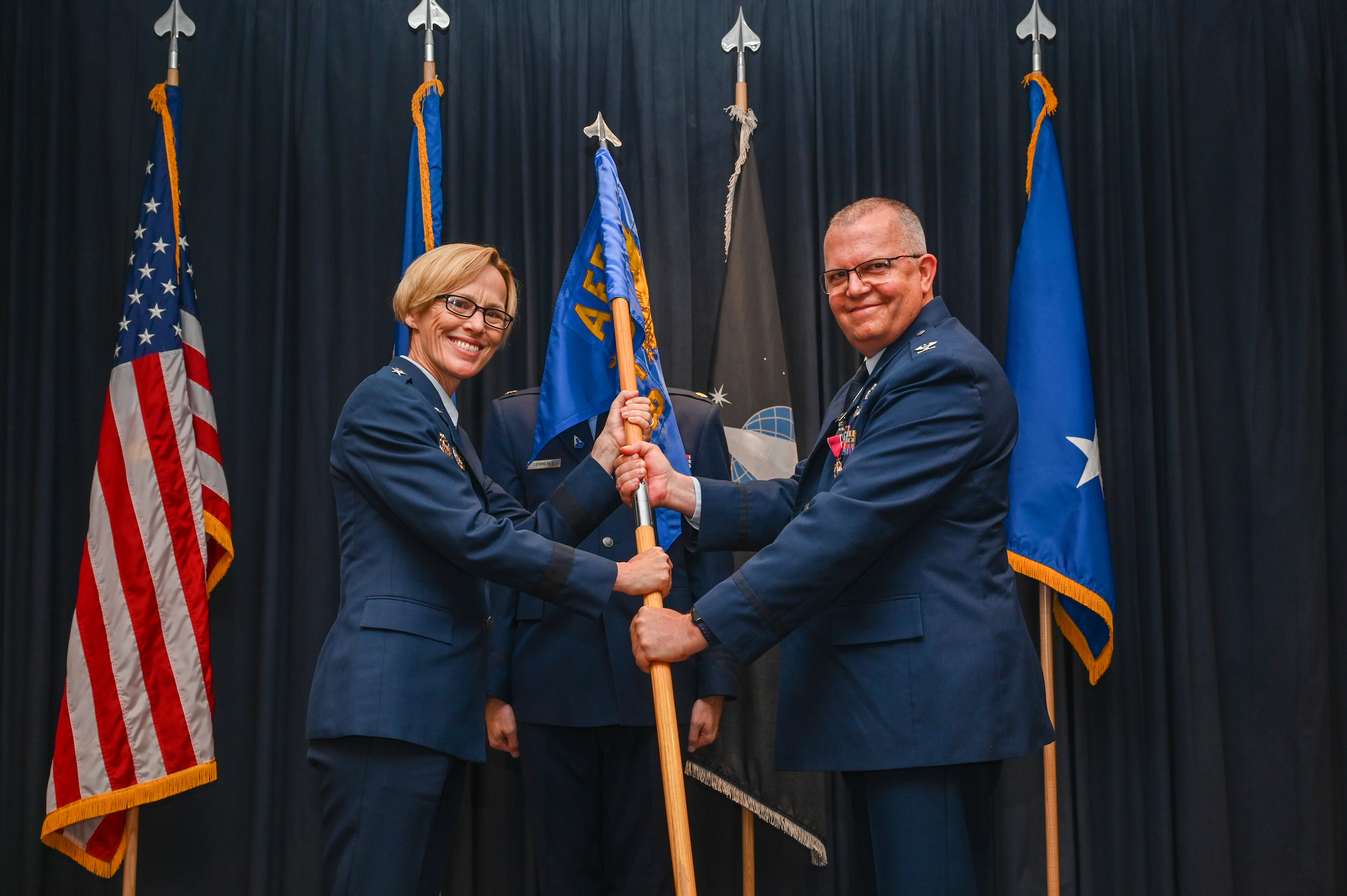 Col. Eric J. Felt relinquishes command of the Air Force Research Laboratory Phillips Research Site to AFRL commander Maj. Gen. Heather Pringle at a change of command ceremony July 13, 2022 at Kirtland Air Force Base, New Mexico. Felt is the AFRL Space Vehicles Directorate director as well as the site commander, which includes the AFRL Directed Energy Directorate. (U.S. Air Force photo/Staff Sgt. Miranda Loera)