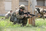 Staff Sgt. Kyler Saxon, center, and other Soldiers with the 160th Engineer Company, Delaware Army National Guard, train at Fort Indiantown Gap, Pa., July 12, 2022, to prepare for deployment.