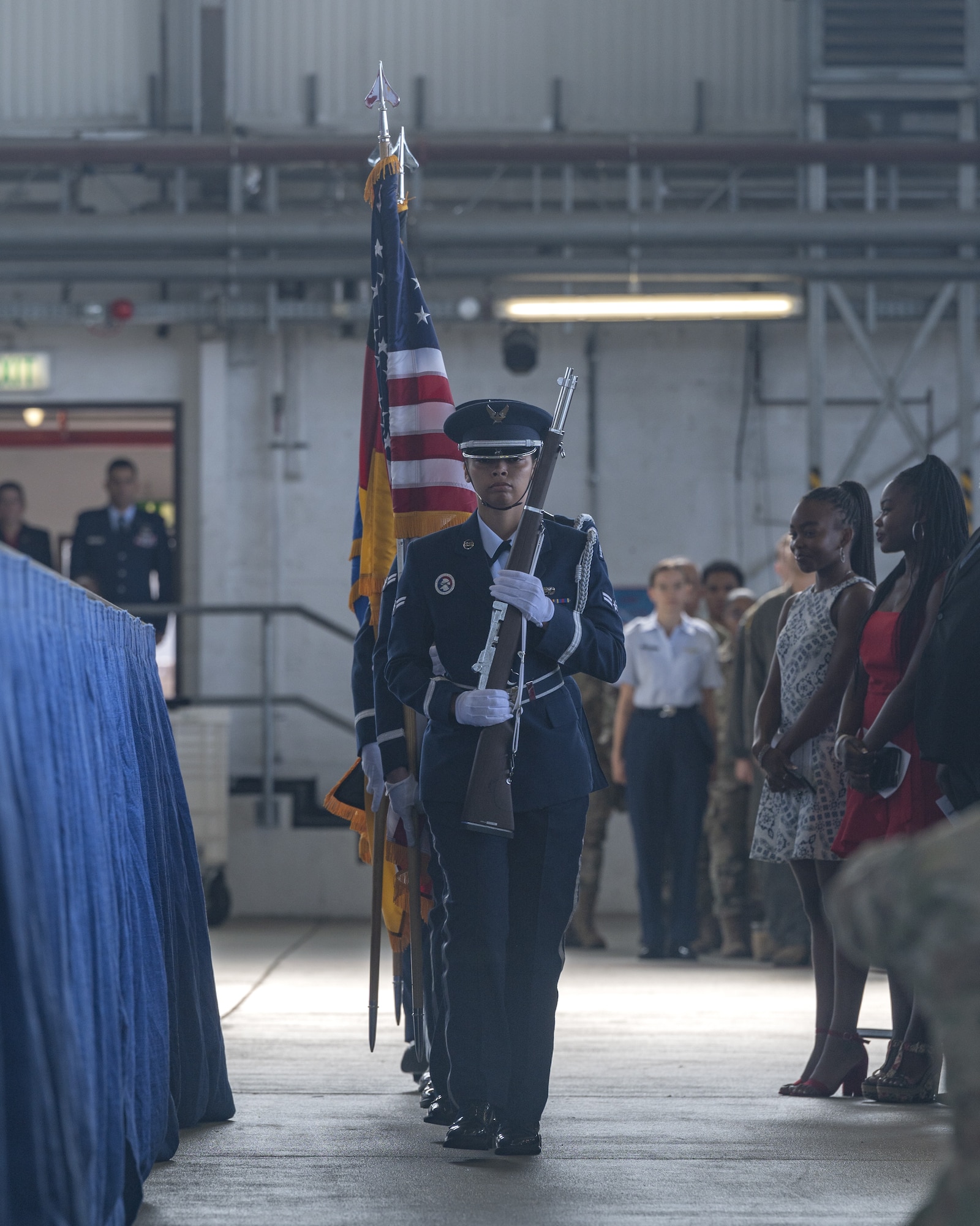 Honor Guardsmen from Ramstein Air  Base, Germany, Honor Guard team present the colors during the 86th Airlift Wing change of command ceremony, at Ramstein Air Base, July 15, 2022. At the ceremony, U.S. Air Force Brig. Gen. Josh Olson, outgoing 86th  Airlift Wing commander relinquished command to Brig. Gen. Otis C. Jones, incoming 86 AW commander. (U.S. Air Force photo by Senior Airman Andrew Bertain)