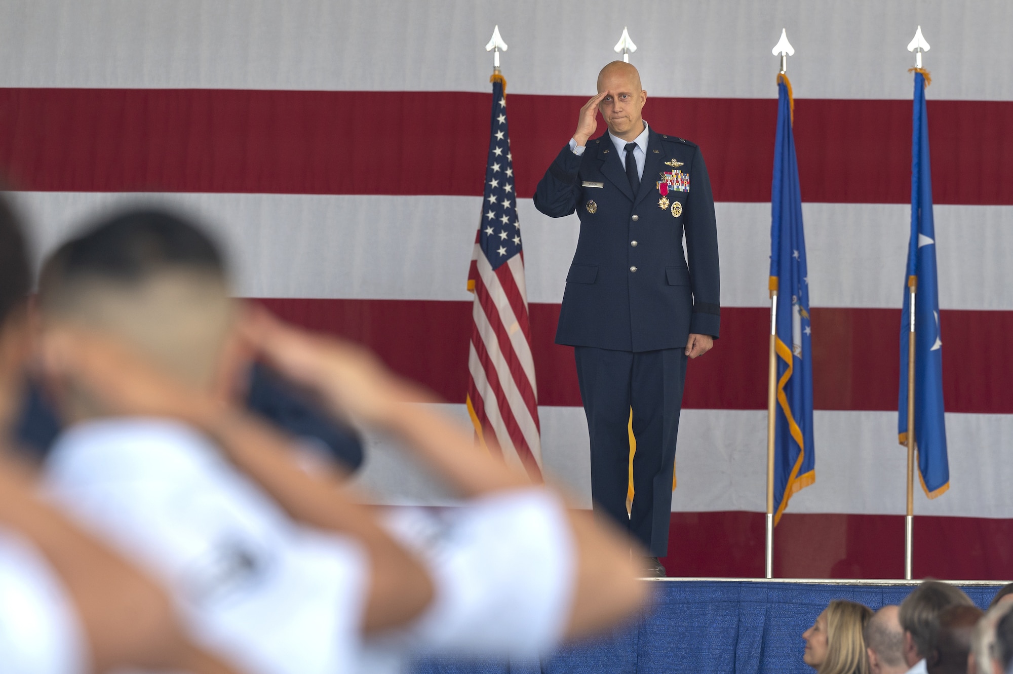 U.S. Air Force Brig. Gen. Josh Olson, outgoing 86th Airlift Wing commander receives his final salute after relinquishing command at Ramstein Air Base, Germany, July 15. In his time as commander, Olson led the wing through the COVID-19 pandemic, provided temporary shelter and security for over 34,000 Afghan evacuees during Operation Allies Refuge, and sought to strengthen relationships with both allies and partners. Most recently, the 86 AW hosted the Ukraine Defense Consultative Group led by the U.S. Secretary of Defense who met with representatives from more than 40 countries. (U.S. Air Force photo by Senior Airman Andrew Bertain)