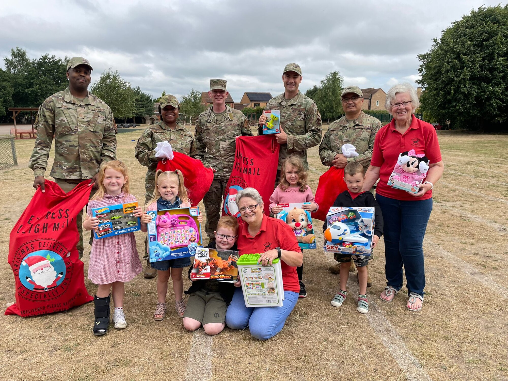 first sergeants donate toys, clothes and books to children