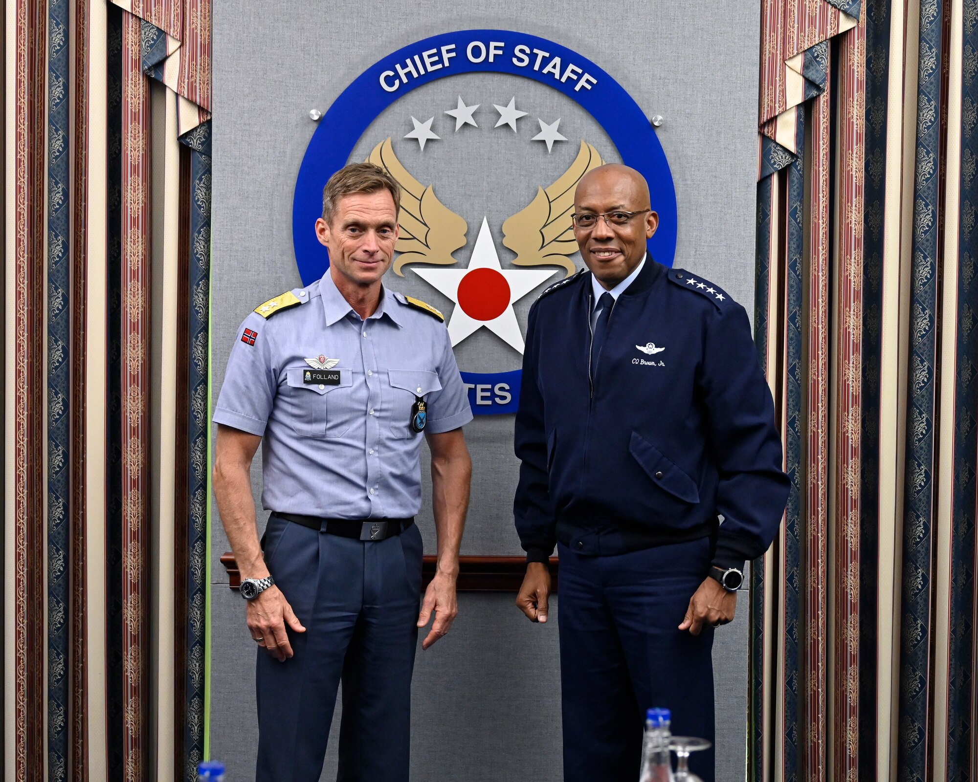 Air Force Chief of Staff Gen. CQ Brown, Jr. poses with Maj. Gen. Rolf Folland, chief of the Royal Norwegian Air Force.