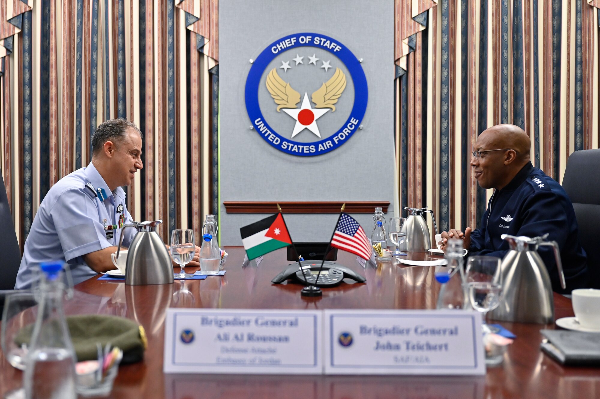 Brig. Gen. Mohammad Hiyasat, left, commander of the Royal Jordanian Air Force, speaks with Air Force Chief of Staff Gen. CQ Brown, Jr.