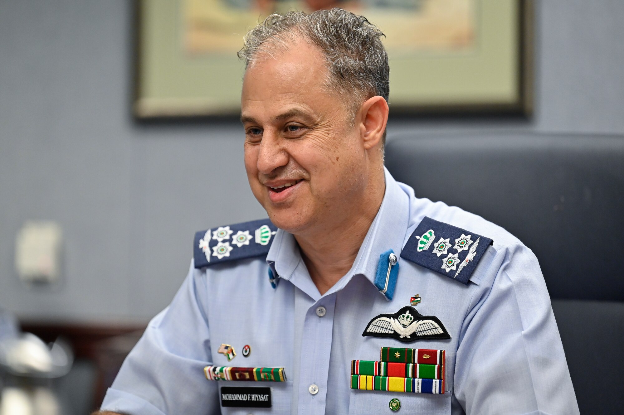 Brig. Gen. Mohammad Hiyasat, commander of the Royal Jordanian Air Force, speaks with Air Force Chief of Staff Gen. CQ Brown, Jr.