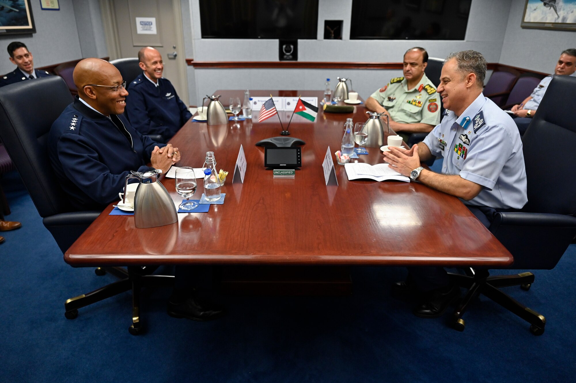 Brig. Gen. Mohammad Hiyasat, right, commander of the Royal Jordanian Air Force, speaks with Air Force Chief of Staff Gen. CQ Brown, Jr.