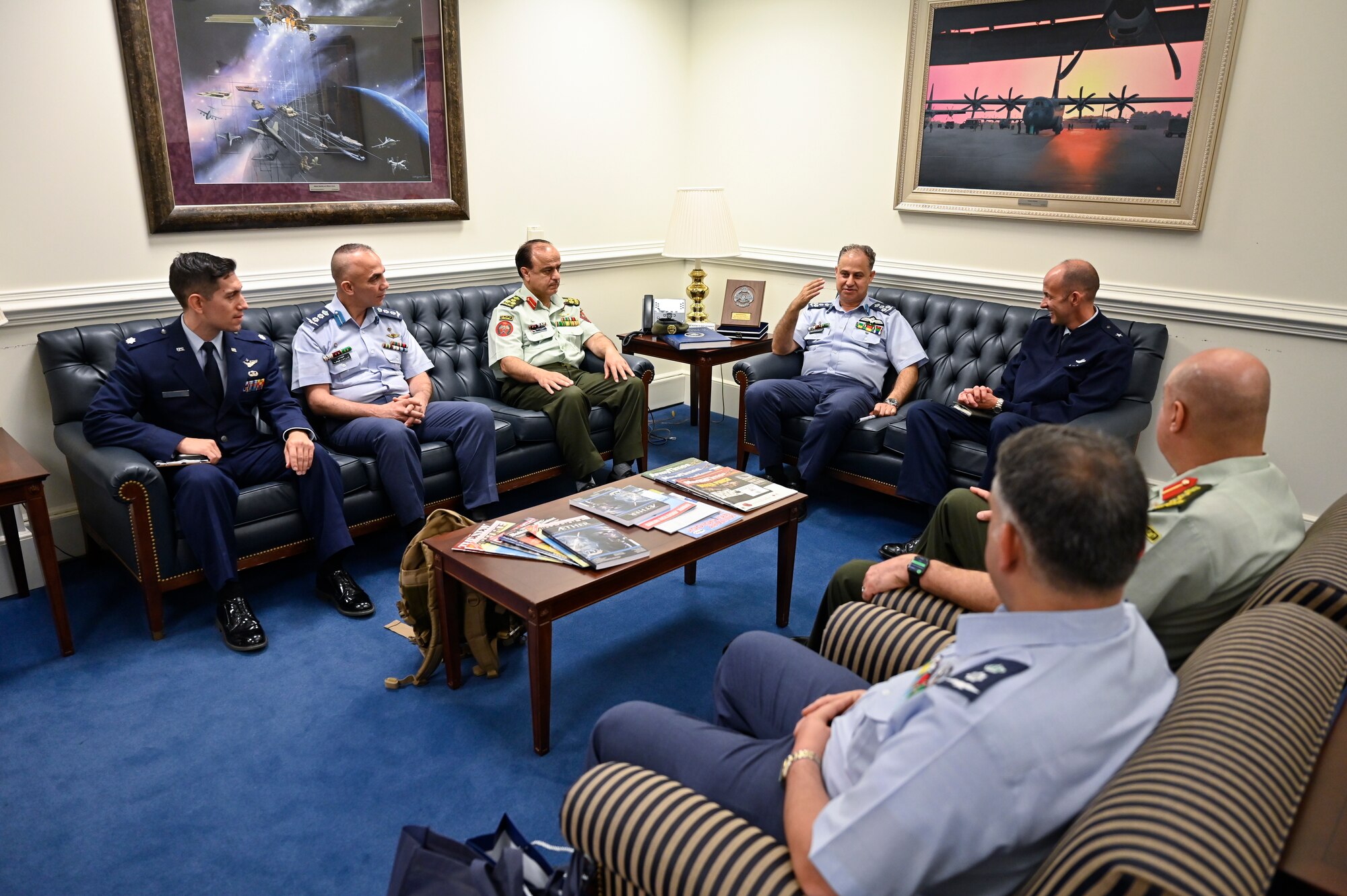 Brig. Gen. Mohammad Hiyasat, fourth from left, commander of the Royal Jordanian Air Force, speaks with Brig. Gen. John Teichert, assistant deputy undersecretary of the Air Force for International Affairs.