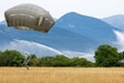 U.S. Army paratroopers with the 173rd Brigade Support Battalion, 173rd Airborne Brigade, exit a CH-47 Chinook during an airborne operation at Juliet Drop Zone, Italy, June 9, 2022. Families of the paratroopers were invited to witness their jump. The 173rd Airborne Brigade is the U.S. Army's Contingency Response Force in Europe, providing rapidly deployable forces to the United States European, African, and Central Command areas of responsibility. Forward deployed across Italy and Germany, the brigade routinely trains alongside NATO allies and partners to build partnerships and strengthen the alliance. (U.S. Army photograph by Staff Sgt. Alexander Skripnichuk)