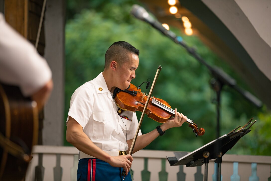 On July 14, 2022, the Marine Band ensemble "Free Country Unplugged" performed an acoustic set at the bumper car pavilion at Glen Echo Park in Maryland. Several audience members took to the floor, dancing to the music.