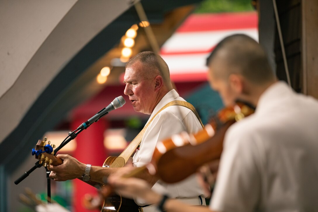 On July 14, 2022, the Marine Band ensemble "Free Country Unplugged" performed an acoustic set at the bumper car pavilion at Glen Echo Park in Maryland. Several audience members took to the floor, dancing to the music.
