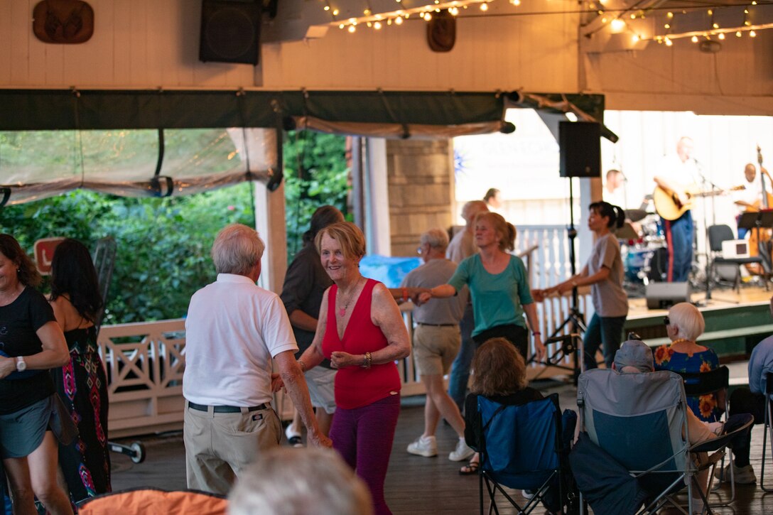 On July 14, 2022, the Marine Band ensemble "Free Country Unplugged" performed an acoustic set at the bumper car pavilion at Glen Echo Park in Maryland. Several audience members took to the floor, dancing to the music.