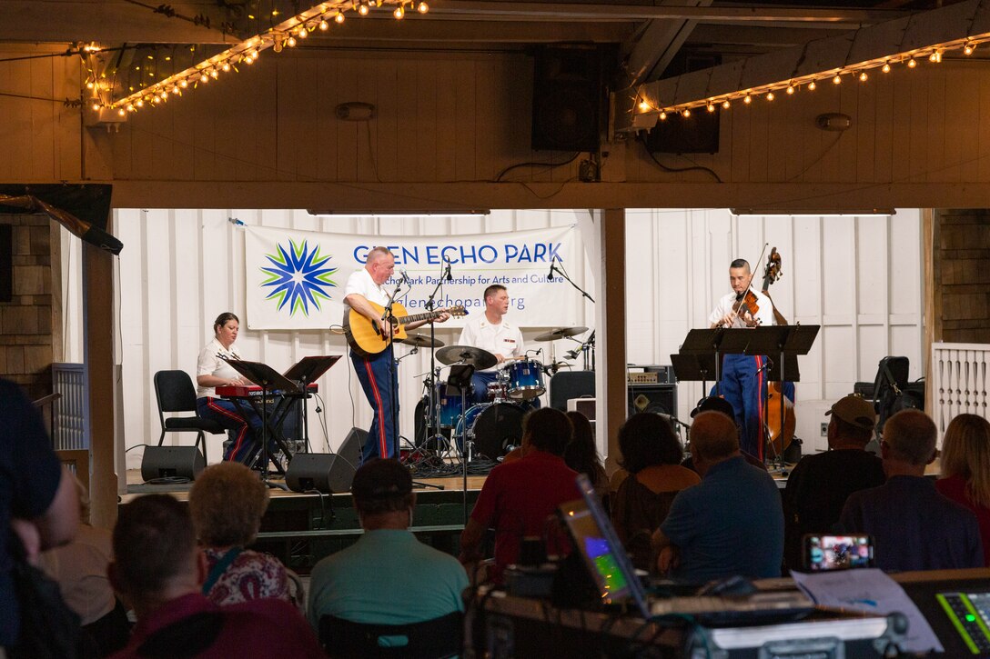 On July 14, 2022, the Marine Band ensemble "Free Country Unplugged" performed an acoustic set at the bumper car pavilion at Glen Echo Park in Maryland. Several audience members took to the floor, dancing to the music.