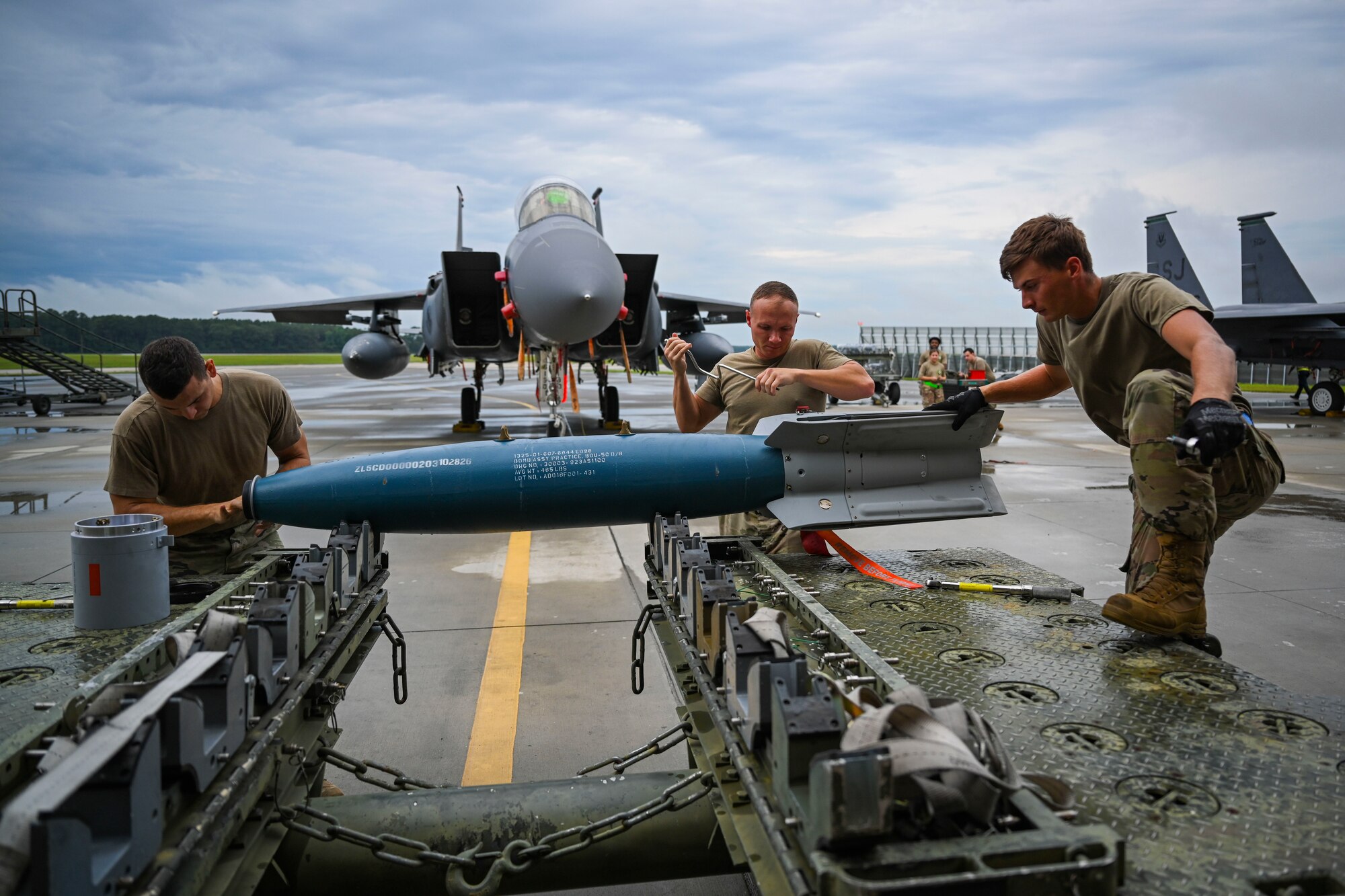 Airmen assigned to the 4th Fighter Wing participate in a quarterly load crew competition at Seymour Johnson Air Force Base, North Carolina, July 15, 2022. The competition was held to build morale and test the load crews loading capabilities. (U.S. Air Force photo by Senior Airman David Lynn)