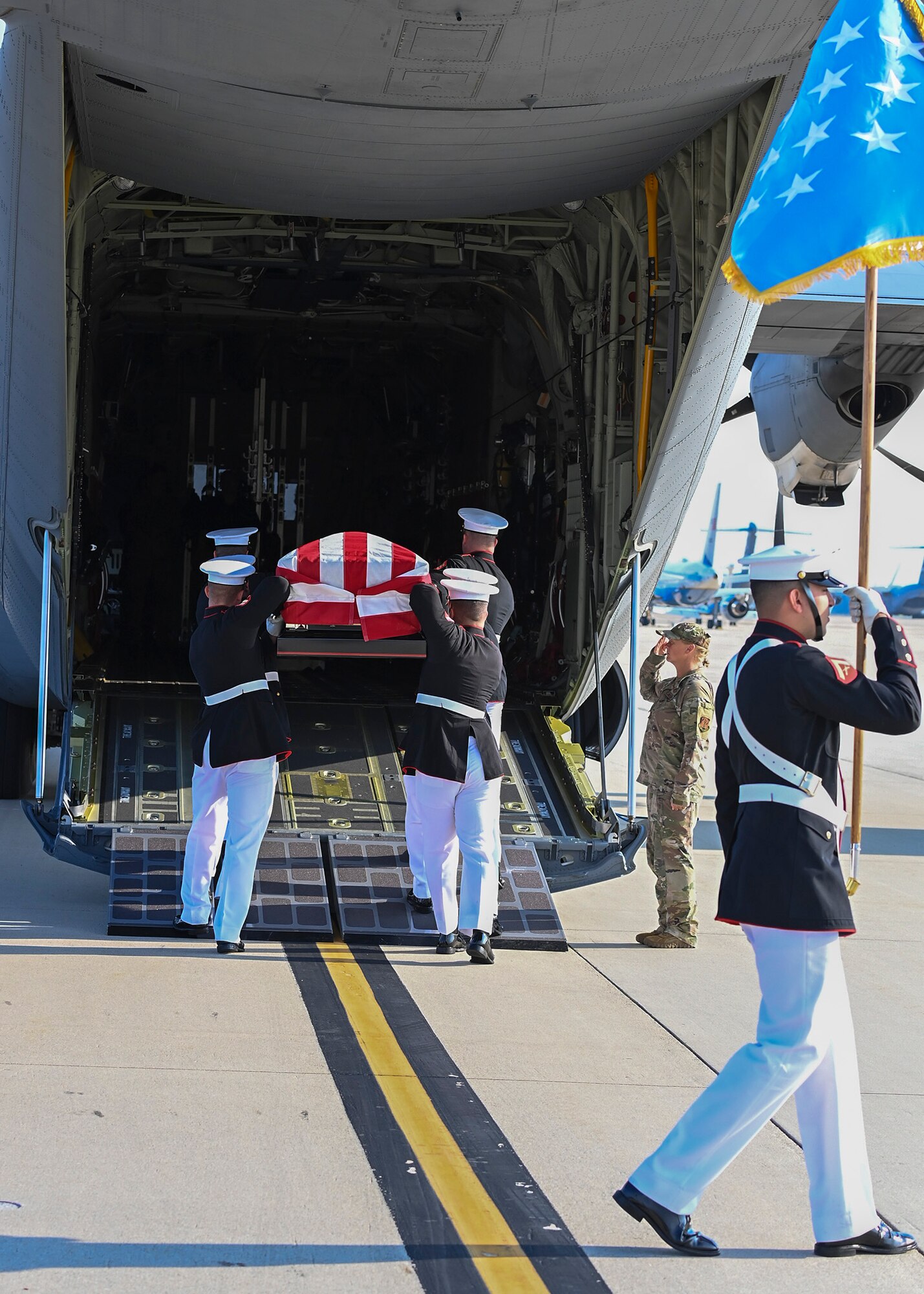 The late Hershel “Woody” Williams, the last surviving Medal of Honor recipient from World War II, departs in a flag-covered casket from Joint Base Andrews, Md., July 15, 2022.