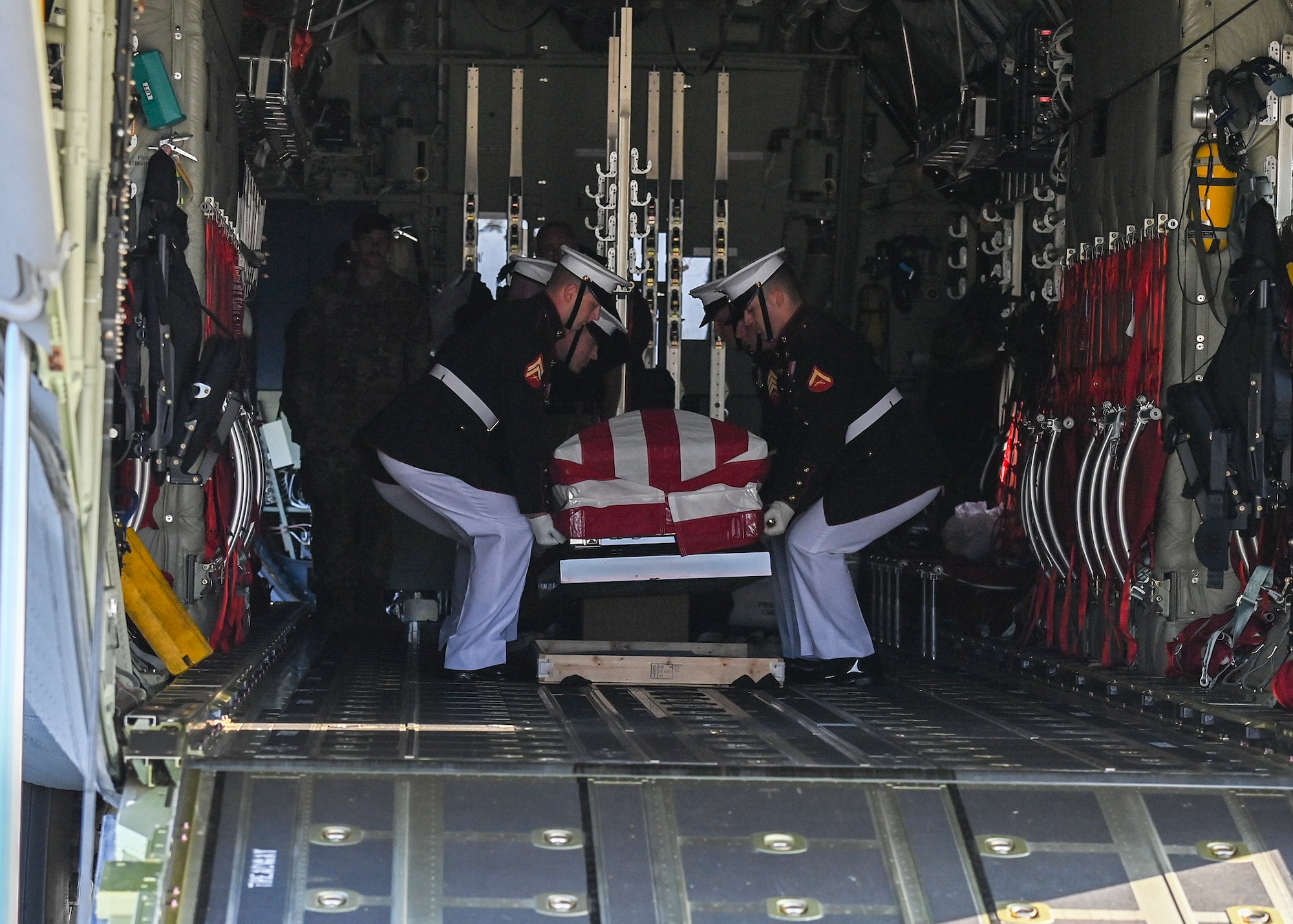 The flag-covered casket of the late Hershel “Woody” Williams, the last surviving Medal of Honor recipient from World War II, is placed on a C-130 departing Joint Base Andrews, Md., July 15, 2022.