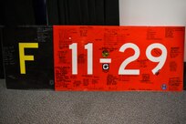 A runway sign that was used during Operation Allies Refuge donated by the 437th Airlift Wing to the National Museum of the U.S. Air Force