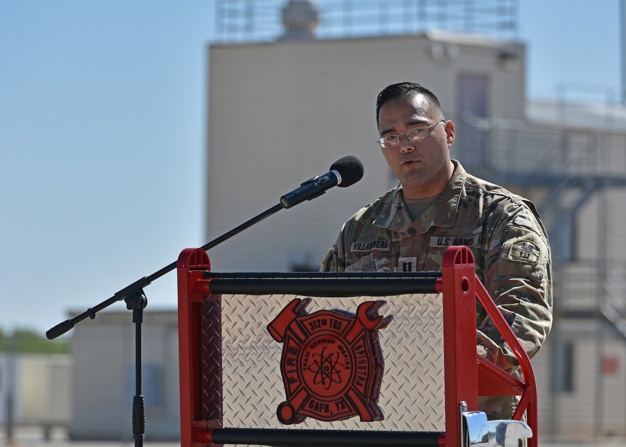 U.S. Army Capt. Astin Villarreal, outgoing Delta Company 169th Engineer Battalion commander, speaks during their change of command at Goodfellow Air Force Base, Texas, July 15, 2022. Villarreal thanked 169th EN BN leadership for their support during his time in command. (U.S. Air Force photo by Senior Airman Ashley Thrash)