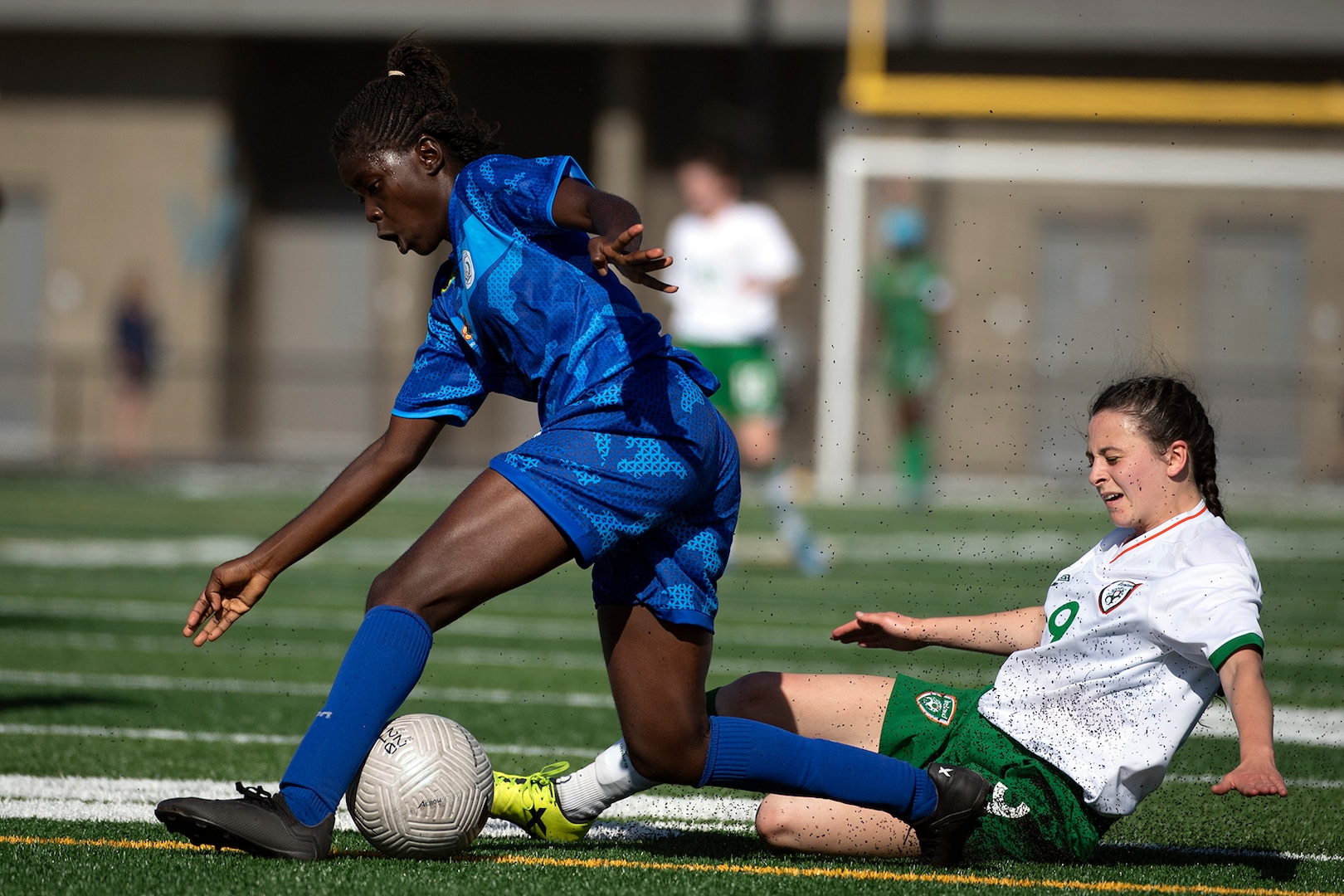 Ireland’s Angela McGuigan slides into Cameroon’s Linda Ngatchou Degoue during the 13th CISM (International Military Sports Council) World Military Women’s Football Championship in Meade, Washington July 15, 2022. (DoD photo by EJ Hersom)