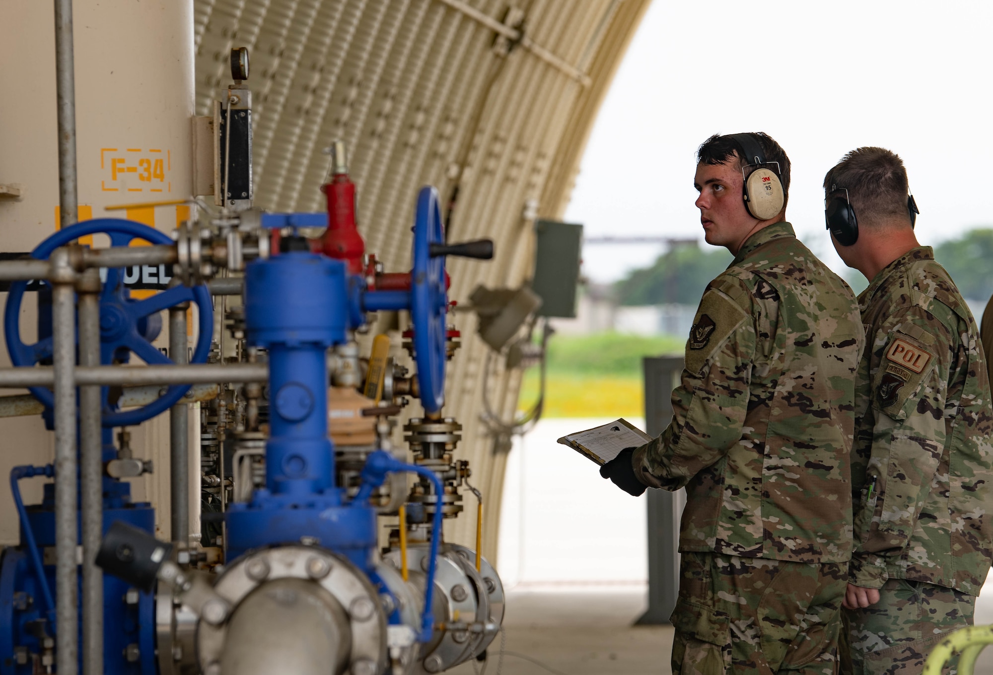 Airman 1st Class Dennis Haggermaker, 8th Logistics Readiness Squadron fuels distribution operator, monitors hot pit refueling of an F-35A Lightning II at Kunsan Air Base, Republic of Korea, July 11, 2022. U.S. Air Force F-35 aircraft from Eielson Air Force Base, Alaska arrived in the Republic of Korea to conduct training flights with ROKAF to enhance interoperability between the two Air Forces on and around the Korean Peninsula. (U.S. Air Force photo by Senior Airman Shannon Braaten)