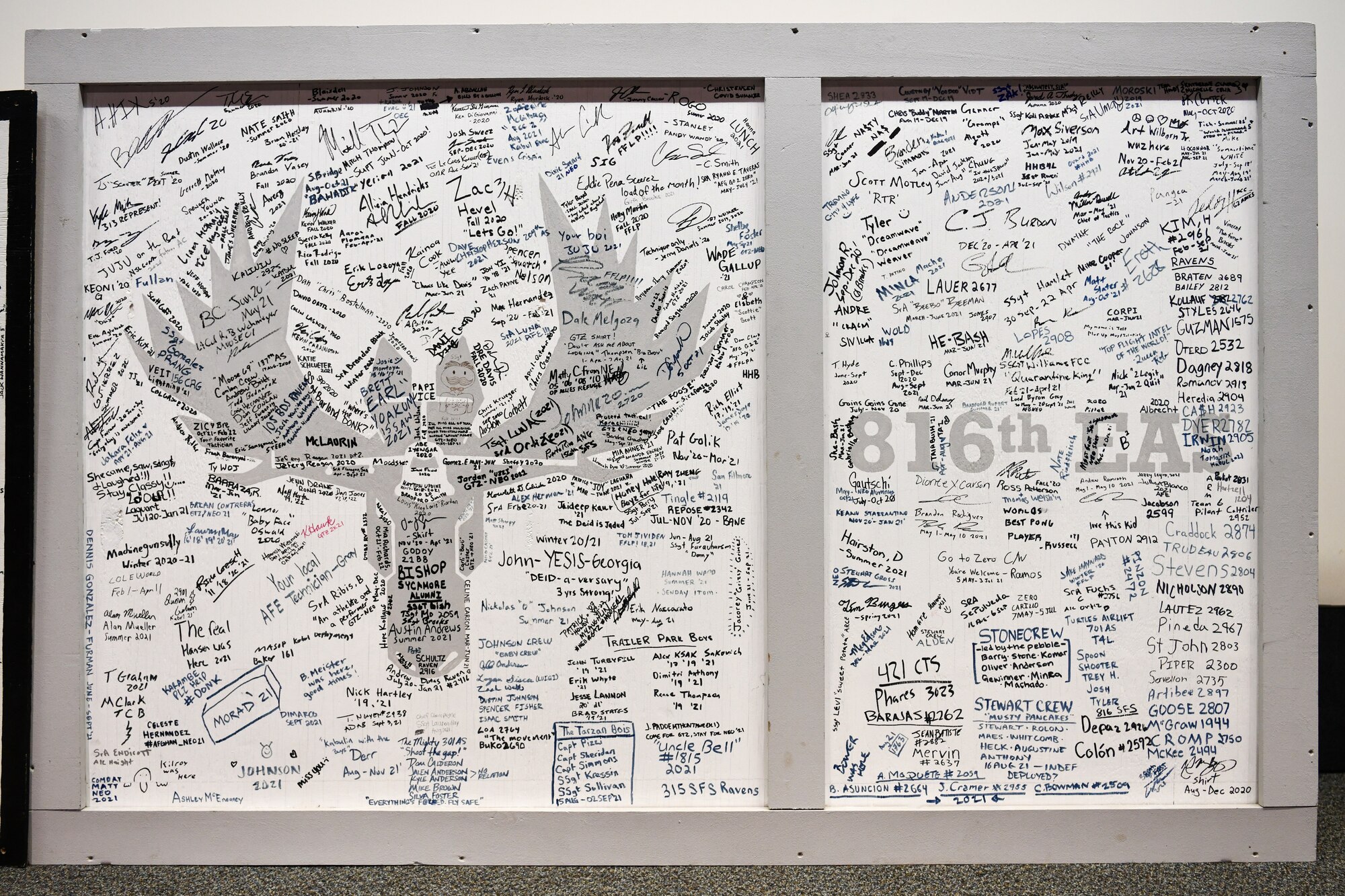 A panel from the 816th Expeditionary Airlift Squadron operations building signed by the Airmen involved with Operation Allies Refuge at the Air Force Museum in Dayton, Ohio, July 11, 2022.