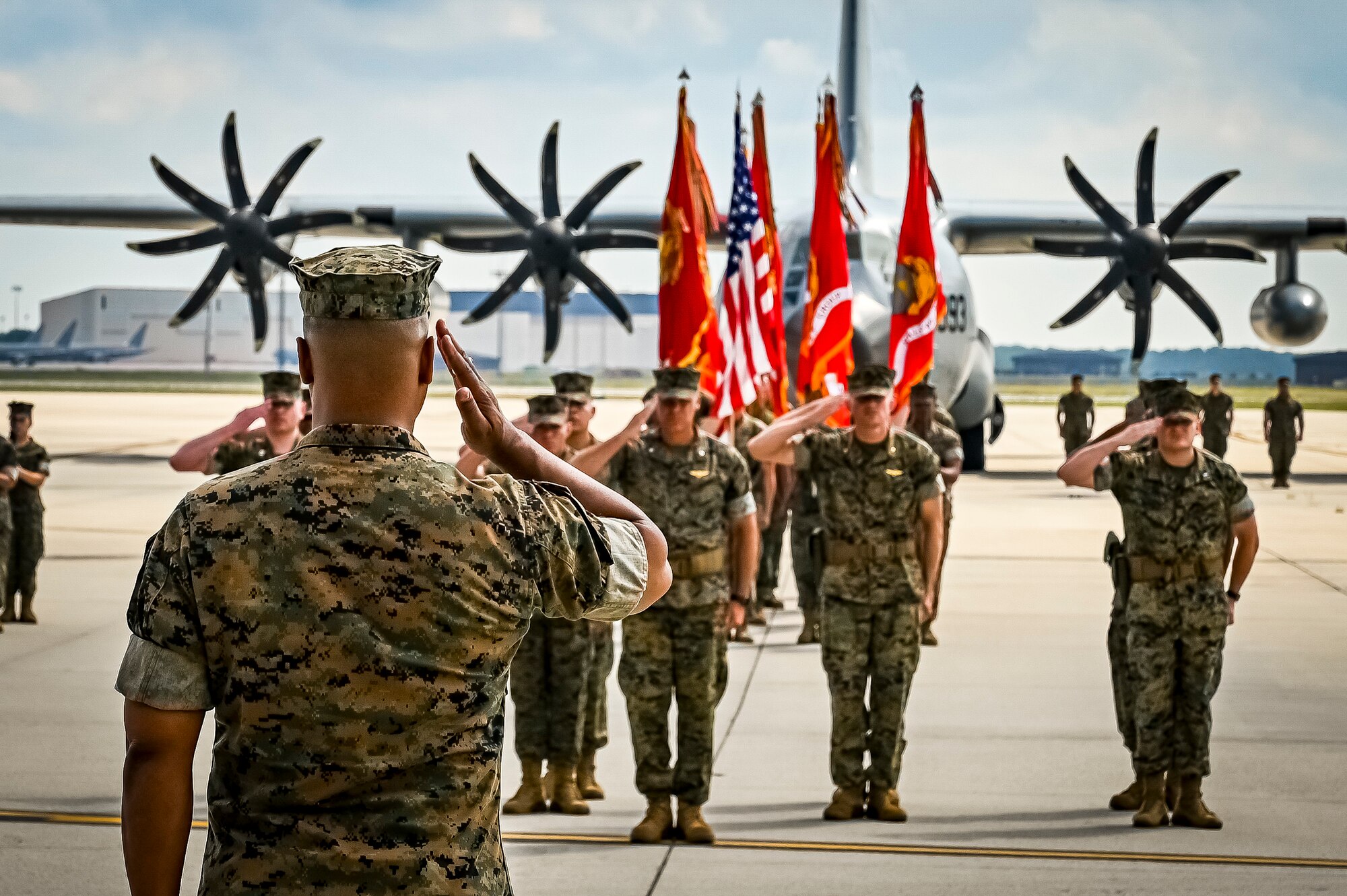 U.S. Marine Corps. Col. Lonnie Cobb, Marine Aircraft Group commander, salutes marines as part of a change of command ceremony on July 16, 2022 at Joint Base McGuire Dix Lakehurst. The change of command ceremony is a military tradition that represents a formal transfer of authority and responsibility for a unit from one officer to another. The mission of MAG 49 is to organize, train, and equip combat ready squadrons to augment and reinforce the active Marine forces in time of war, national emergency, or contingency operations, and to provide personnel and assault support capabilities to relieve operational tempo for active duty forces. (U.S. Air Force Photo by Senior Airman Matt Porter)