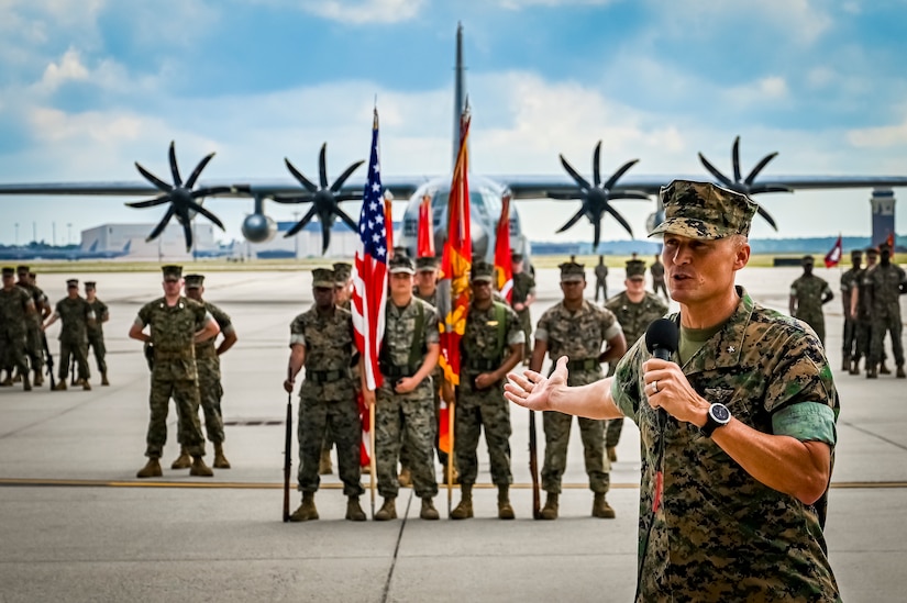 U.S. Marine Corps. Gen. Leonard Anderson, 4th Marine Aircraft Wing commander, speaks to an audience as part of a change of command ceremony on July 16, 2022 at Joint Base McGuire Dix Lakehurst. The change of command ceremony is a military tradition that represents a formal transfer of authority and responsibility for a unit from one officer to another. The mission of MAG 49 is to organize, train, and equip combat ready squadrons to augment and reinforce the active Marine forces in time of war, national emergency, or contingency operations, and to provide personnel and assault support capabilities to relieve operational tempo for active duty forces. (U.S. Air Force Photo by Senior Airman Matt Porter)