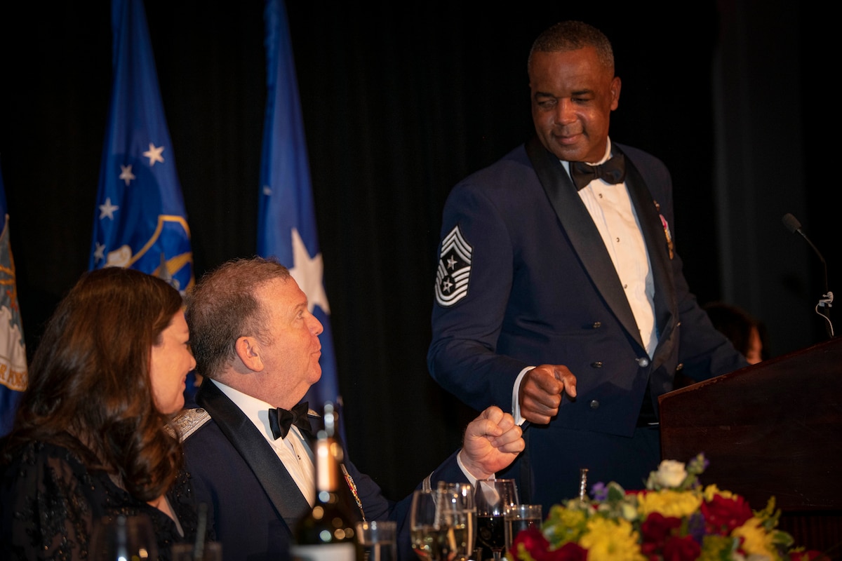 photo of Lt. Gen. Richard W. Scobee fist bumping Air Force Reserve Command Chief Timothy White.