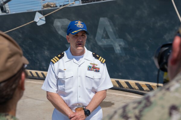 Cmdr. Sam T. Sareini, commanding officer of the Arleigh Burke-class guided-missile destroyer USS Nitze (DDG 94), gives an interview prior to Nitze deploying from Naval Station Norfolk, July 17.