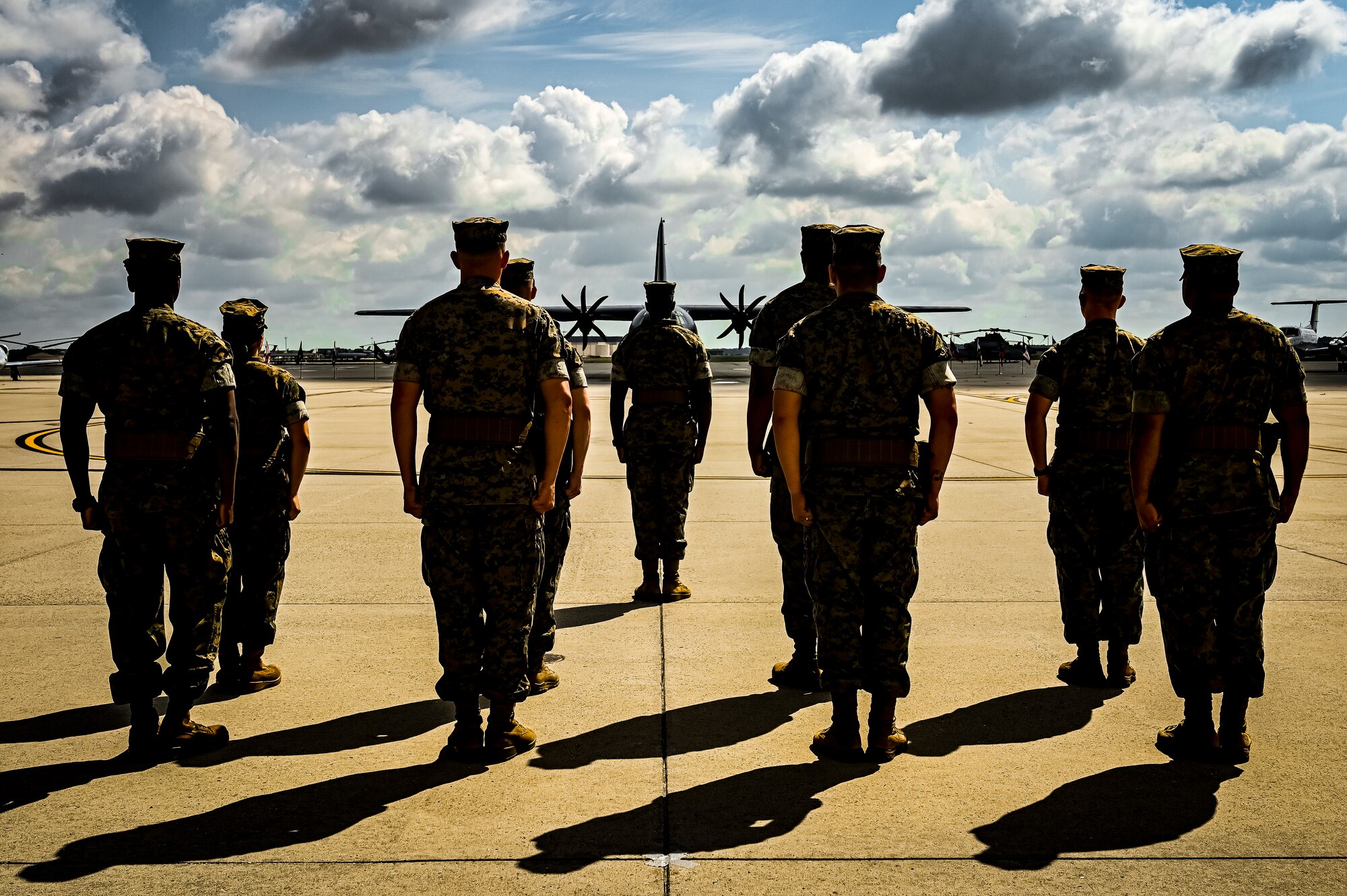 U.S. Marine Corps. marines assigned to Marine Aircraft Group 49 stand at attention during a relief and appointment retirement ceremony on July 17, 2022 at Joint Base McGuire Dix Lakehurst, N.J. The relief and appointment is a military tradition that represents a formal transfer of authority and responsibility for a unit from one senior noncommissioned officer to another. The mission of MAG 49 is to organize, train, and equip combat ready squadrons to augment and reinforce the active Marine forces in time of war, national emergency, or contingency operations, and to provide personnel and assault support capabilities to relieve operational tempo for active duty forces. (U.S. Air Force Photo by Senior Airman Matt Porter)