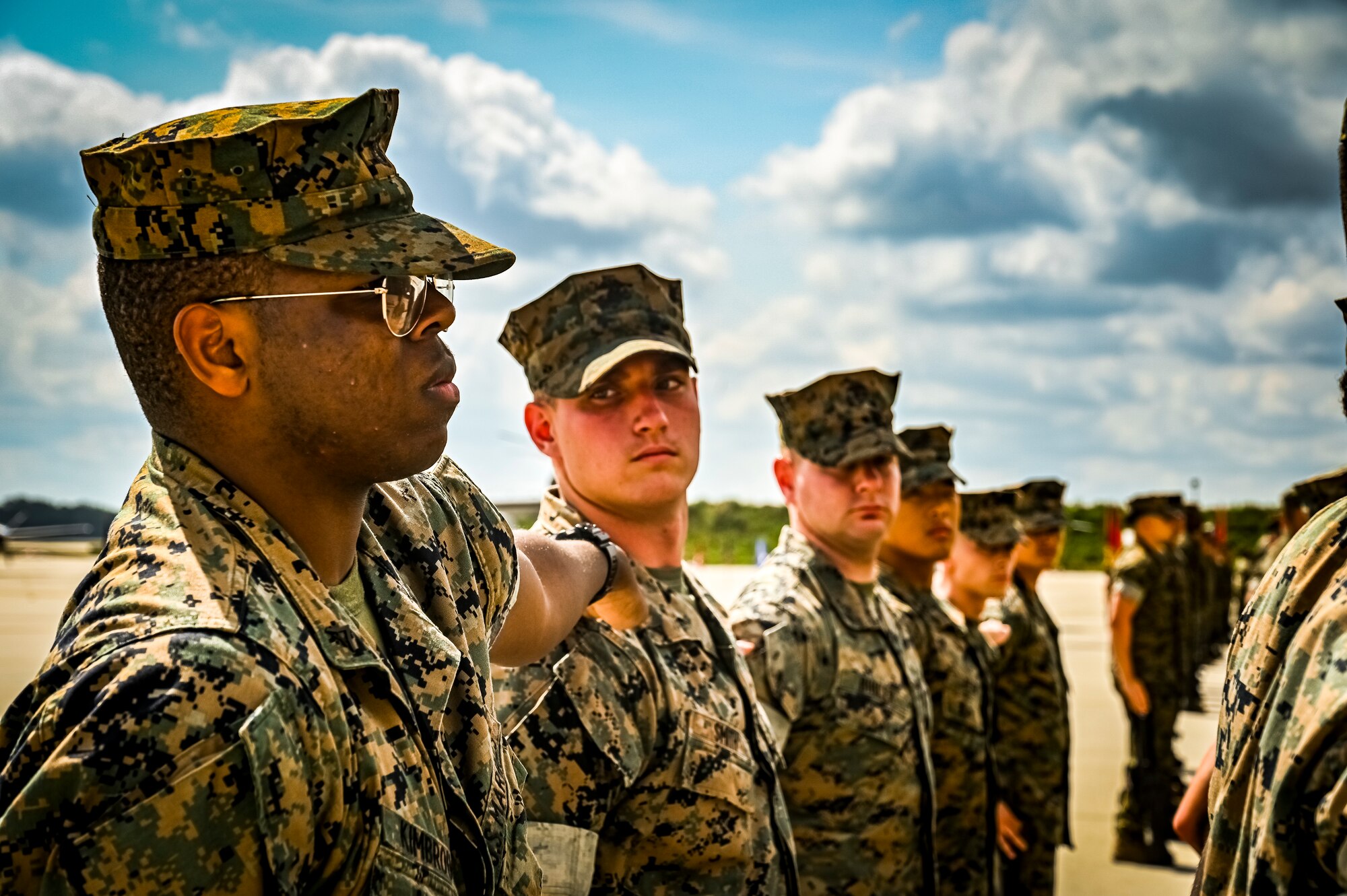 U.S. Marine Corps. Marines assigned to Marine Aircraft Group 49 dress right during a relief and appointment retirement ceremony on July 17, 2022 at Joint Base McGuire Dix Lakehurst, N.J. The relief and appointment is a military tradition that represents a formal transfer of authority and responsibility for a unit from one senior noncommissioned officer to another. The mission of MAG 49 is to organize, train, and equip combat ready squadrons to augment and reinforce the active Marine forces in time of war, national emergency, or contingency operations, and to provide personnel and assault support capabilities to relieve operational tempo for active duty forces. (U.S. Air Force Photo by Senior Airman Matt Porter)