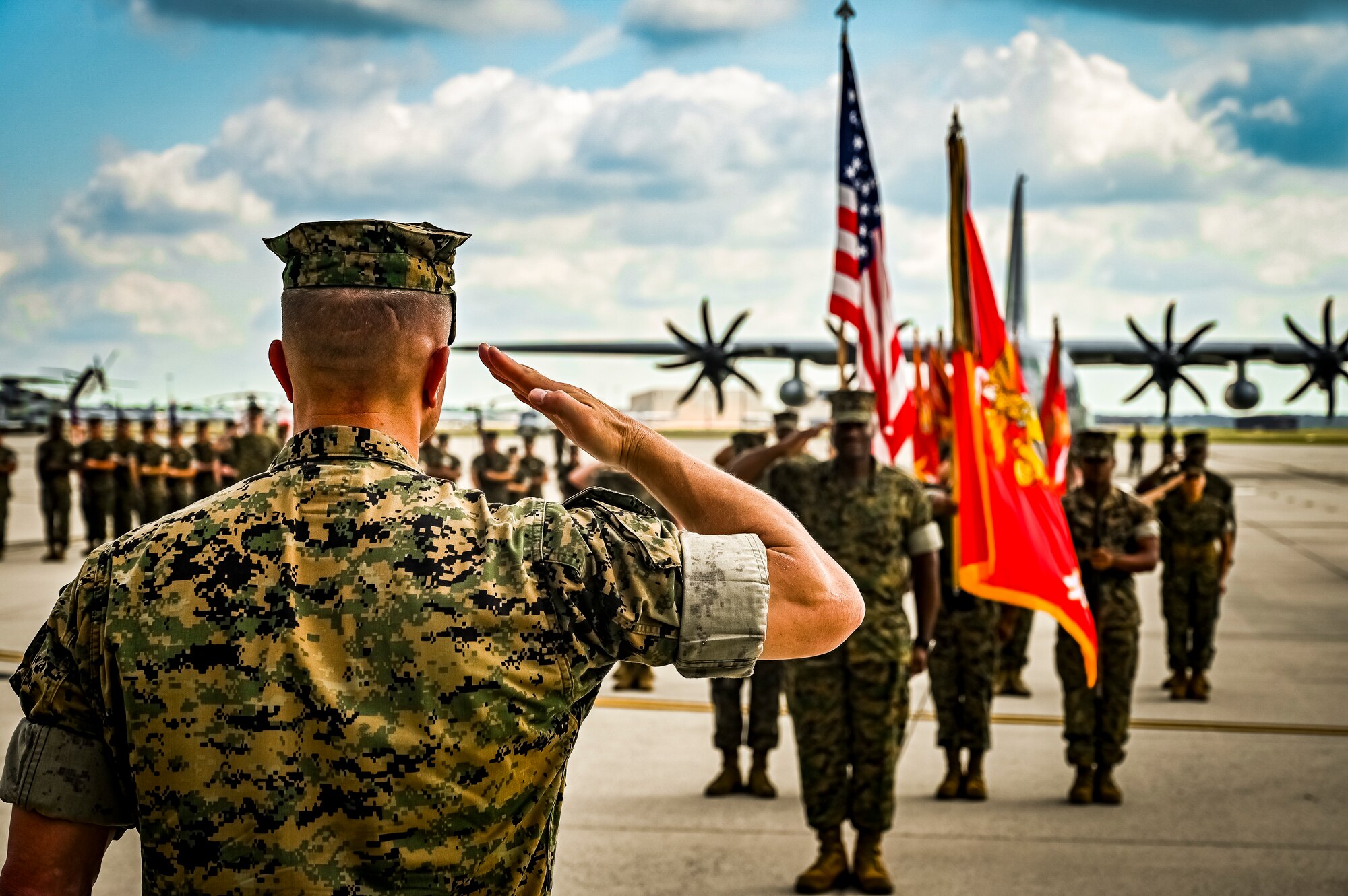 U.S. Marine Corps. Sg. Maj. William Singleton, Marine Aircraft Group 49 sergeant major, renders a salute to U.S. Marine Corps. Brig. Gen. Leonard Anderson, 4th Marine Aircraft Wing commander, during a relief and appointment retirement ceremony on July 17, 2022 at Joint Base McGuire Dix Lakehurst, N.J. The relief and appointment is a military tradition that represents a formal transfer of authority and responsibility for a unit from one senior noncommissioned officer to another. The mission of MAG 49 is to organize, train, and equip combat ready squadrons to augment and reinforce the active Marine forces in time of war, national emergency, or contingency operations, and to provide personnel and assault support capabilities to relieve operational tempo for active duty forces. (U.S. Air Force Photo by Senior Airman Matt Porter)