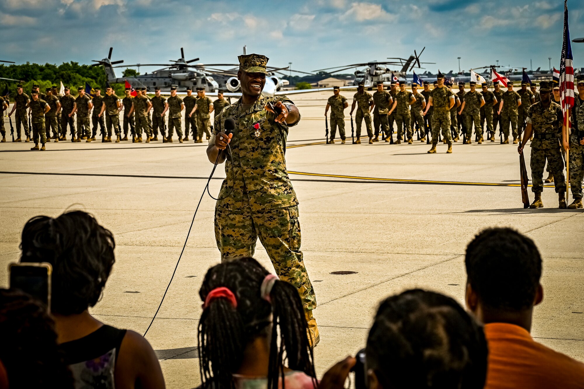 U.S. Marine Corps. Sg. Maj. William Singleton, Marine Aircraft Group 49 sergeant major, gives his retirement speech during a relief and appointment retirement ceremony on July 17, 2022 at Joint Base McGuire Dix Lakehurst, N.J. The relief and appointment is a military tradition that represents a formal transfer of authority and responsibility for a unit from one senior noncommissioned officer to another. The mission of MAG 49 is to organize, train, and equip combat ready squadrons to augment and reinforce the active Marine forces in time of war, national emergency, or contingency operations, and to provide personnel and assault support capabilities to relieve operational tempo for active duty forces. (U.S. Air Force Photo by Senior Airman Matt Porter)