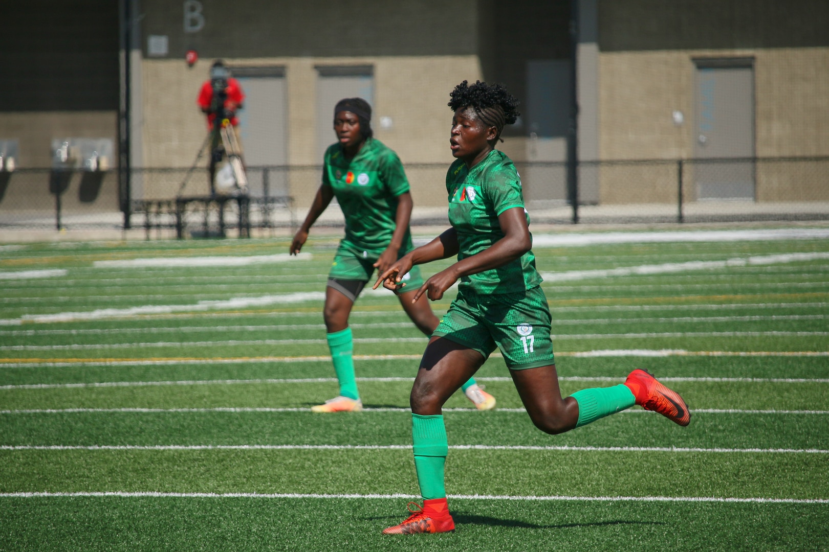 Cameroon's Ebika Tabe drives down the field on her way to score Cameroon's second goal of the match in a 3-0 victory over Germany in match 13 of the 13th Conseil International du Sport Militaire (CISM) World Women's Military Football Championship hosted by Fairchild Air Force Base in Spokane, Washingon.  This year's championship features teams from the United States, Belgium, Cameroon, Canada, France, Germany, Ireland, Mali, Netherlands, and South Korea.  (Department of Defense Photo by Mr. Steven Dinote, released).